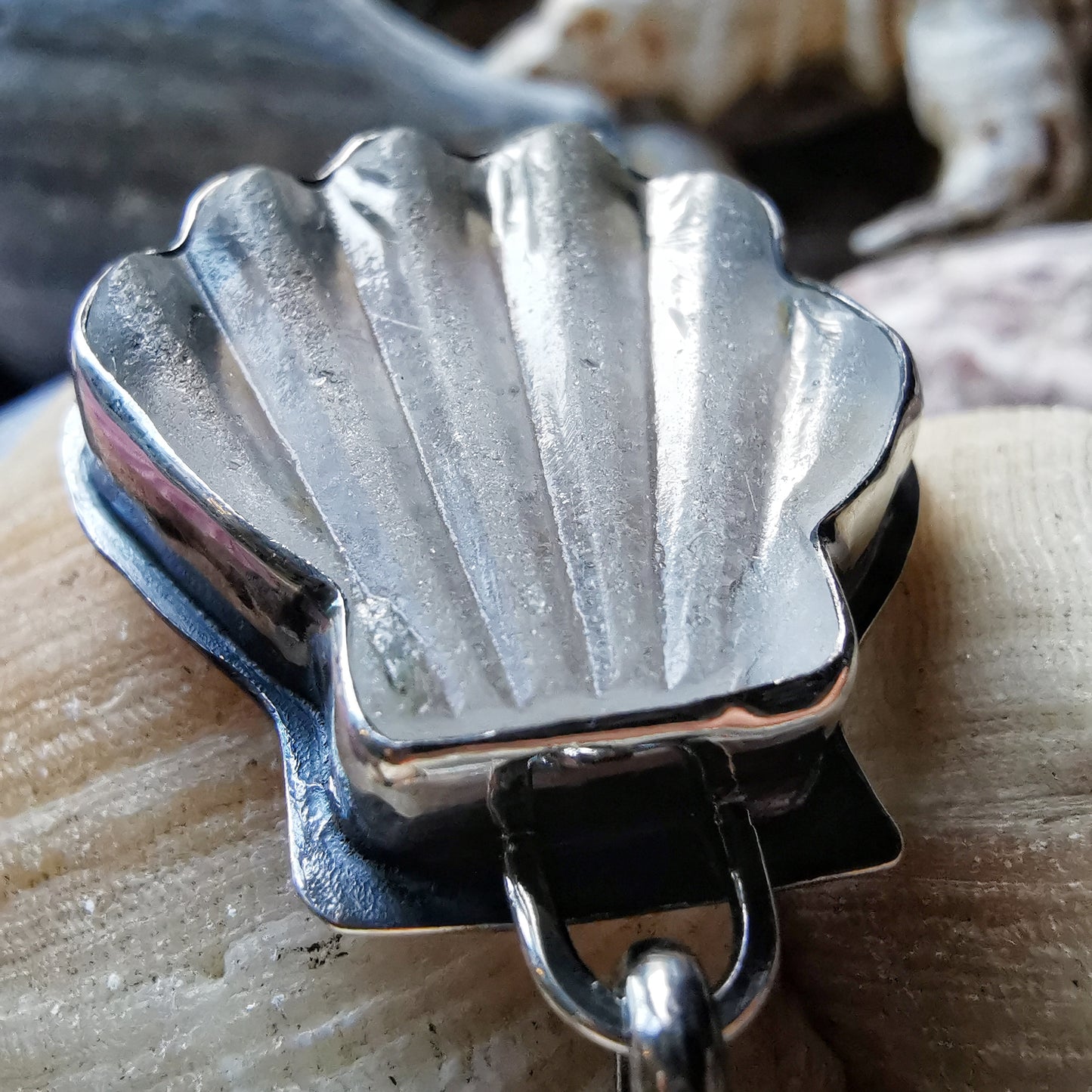 Scottish clear sea glass shell & sterling silver pendant.