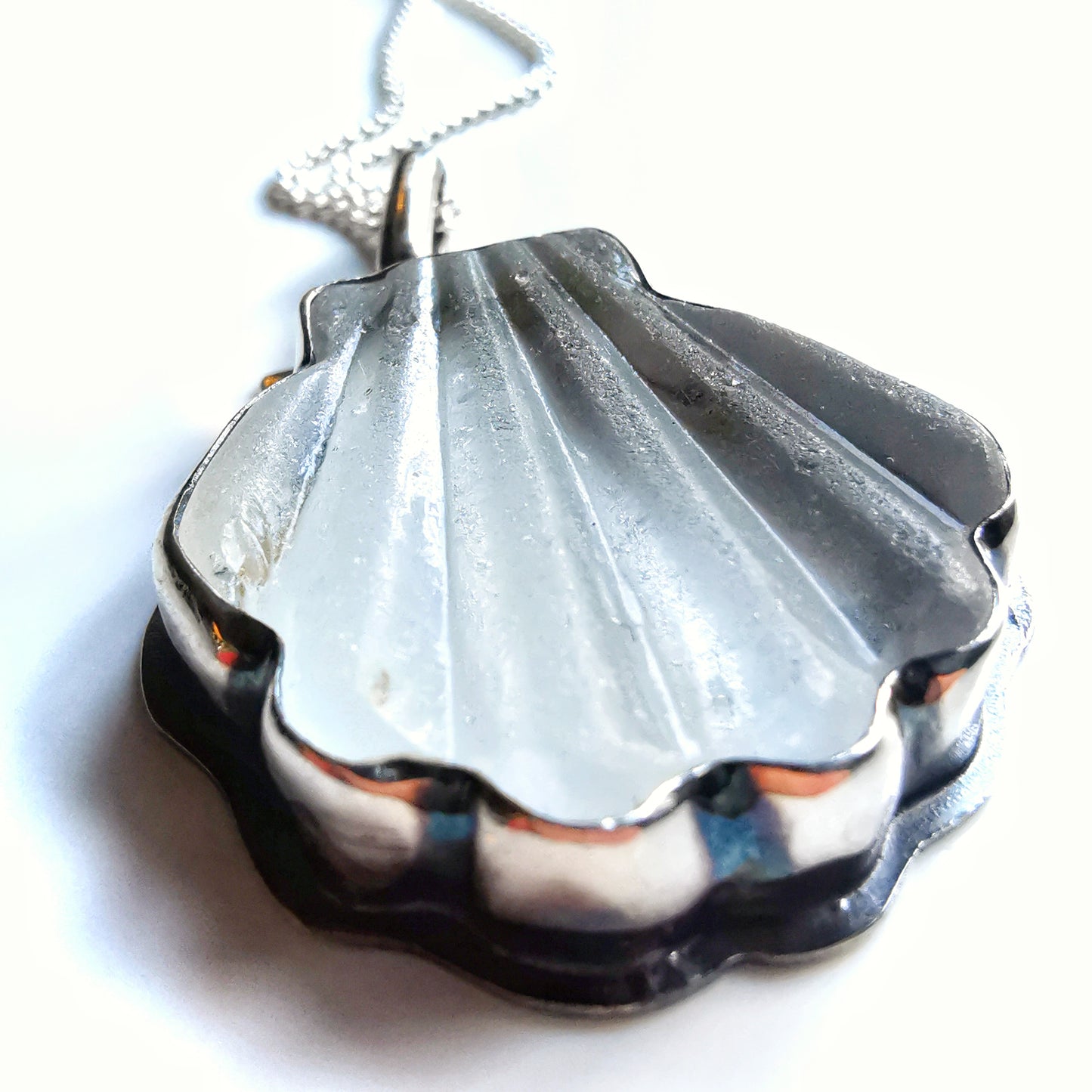 Scottish clear sea glass shell & sterling silver pendant.