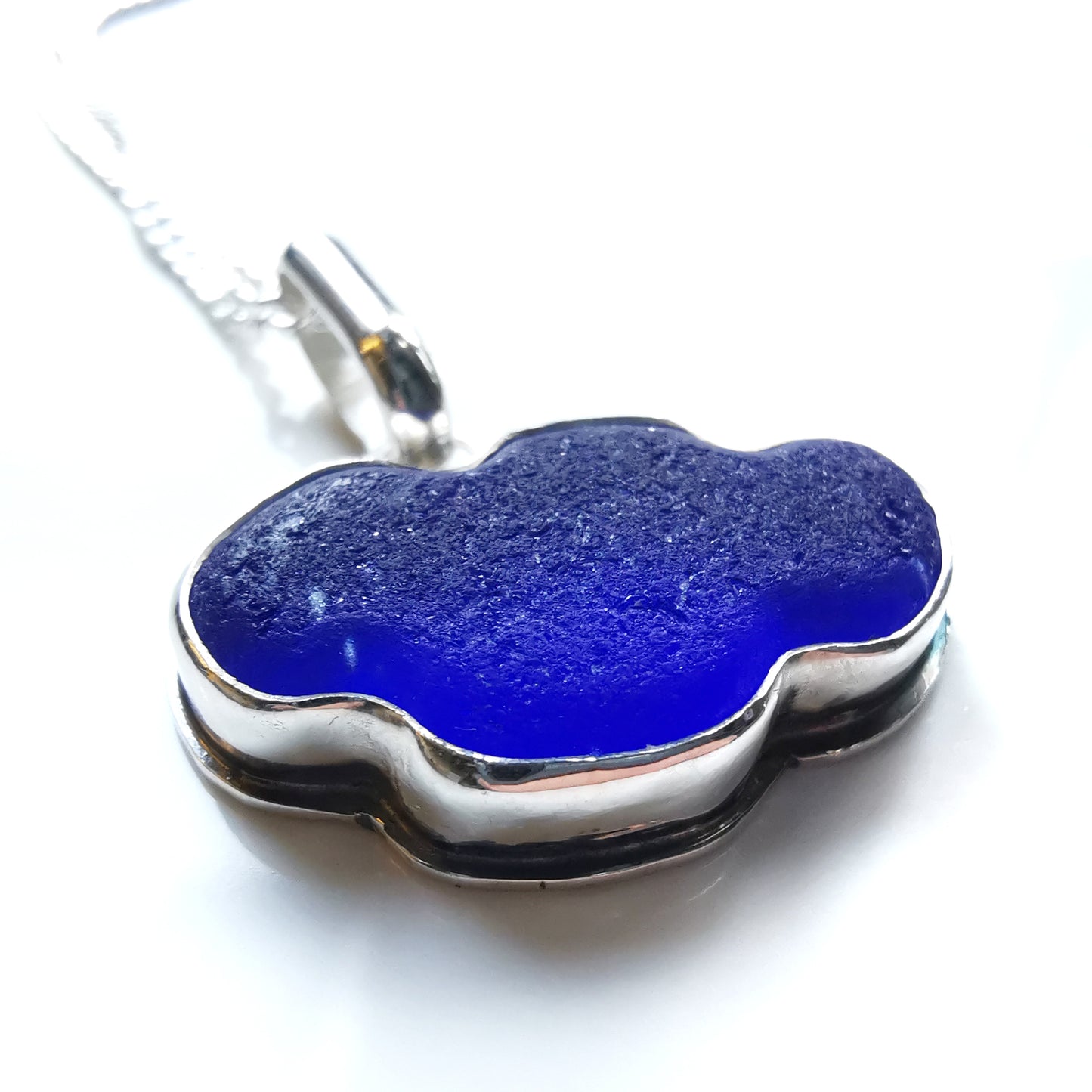 Scottish blue sea glass cloud & sterling silver pendant.