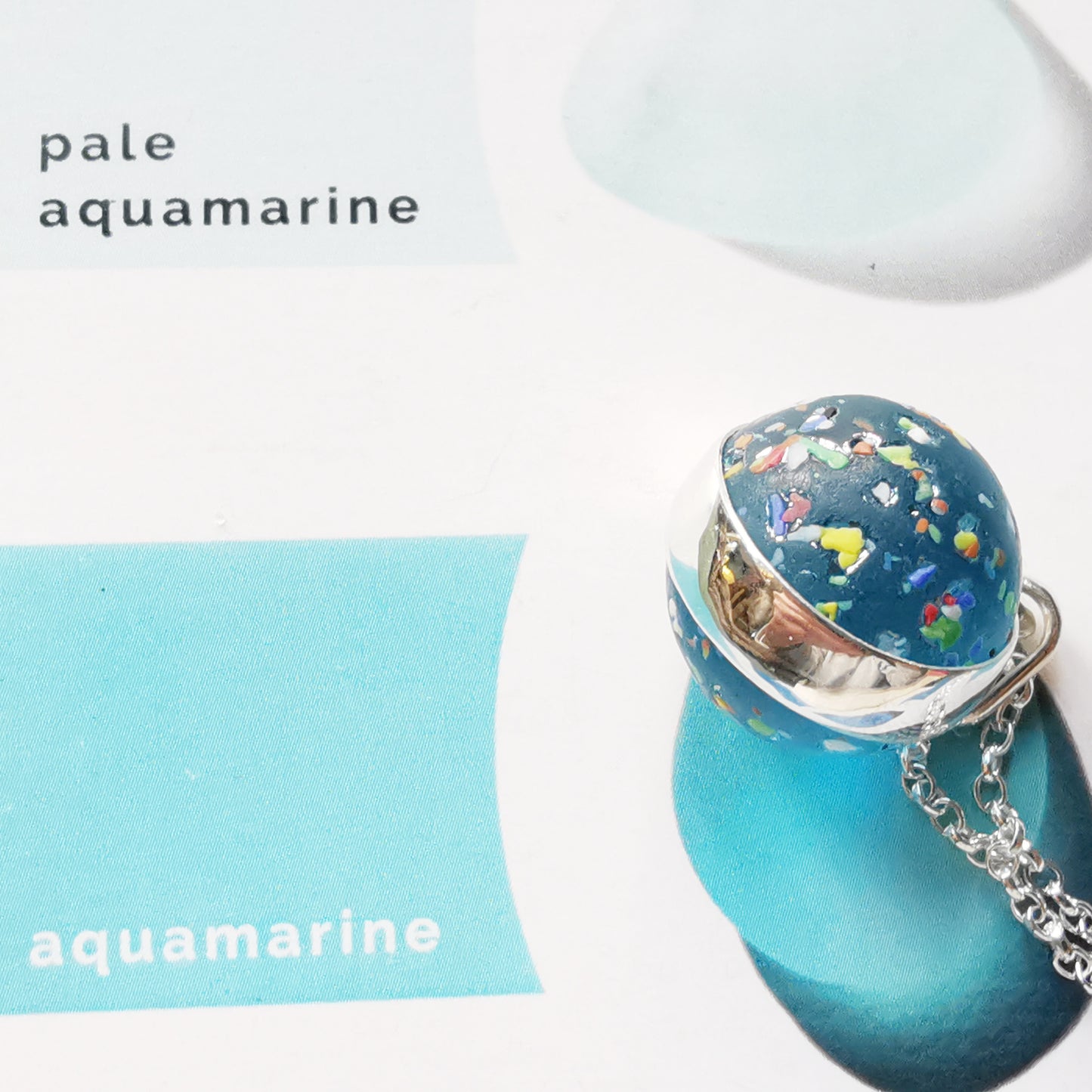 Aquamarine rainbow confetti sea glass marble & sterling silver pendant.