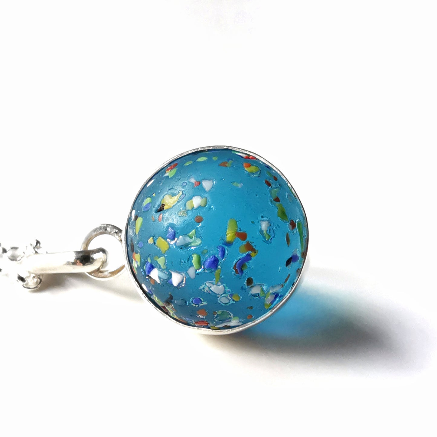 Aquamarine rainbow confetti sea glass marble & sterling silver pendant.