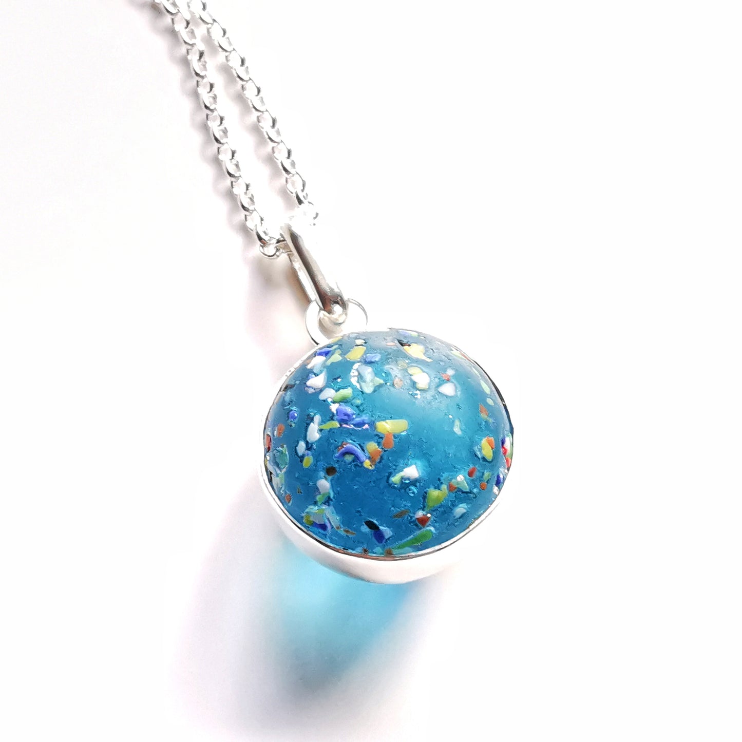 Aquamarine rainbow confetti sea glass marble & sterling silver pendant.