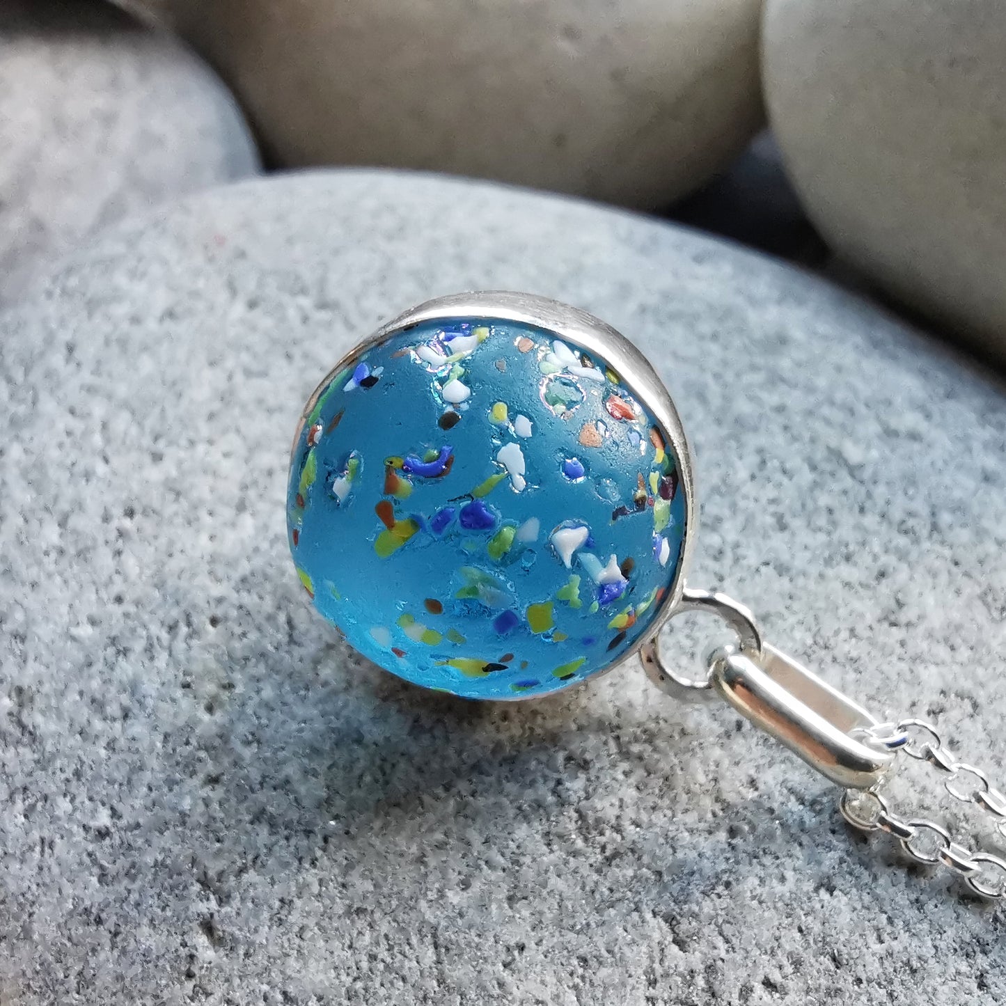 Aquamarine rainbow confetti sea glass marble & sterling silver pendant.