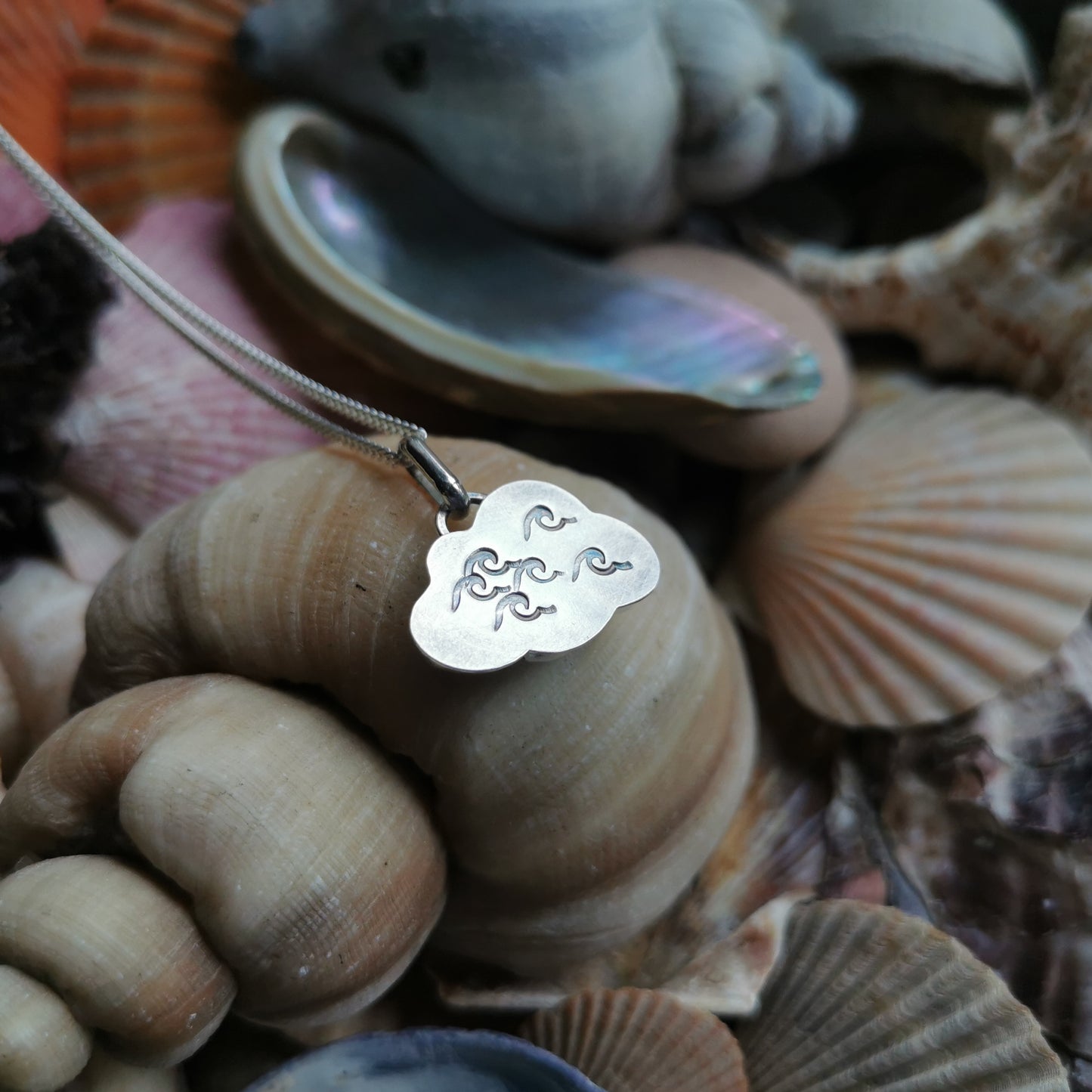 Blue and white sea glass cloud & sterling silver pendant.