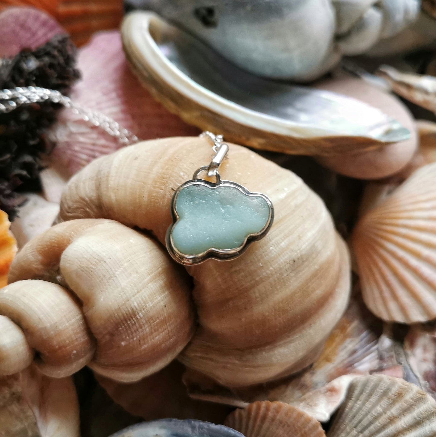 Opalescent sea glass cloud & sterling silver pendant.