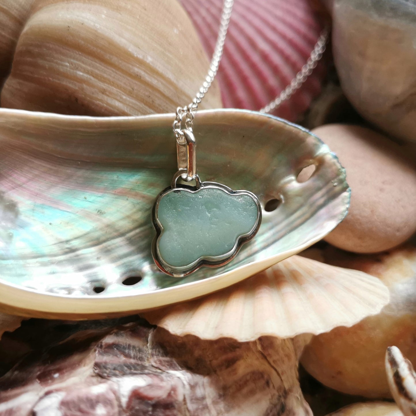 Opalescent sea glass cloud & sterling silver pendant.