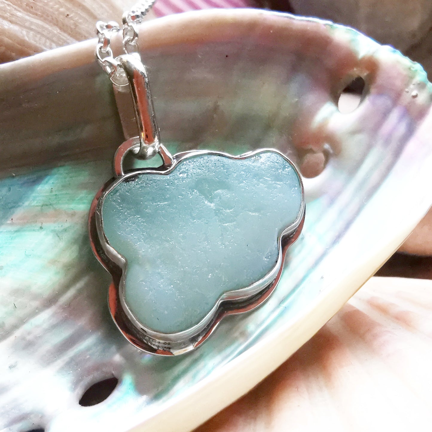 Opalescent sea glass cloud & sterling silver pendant.