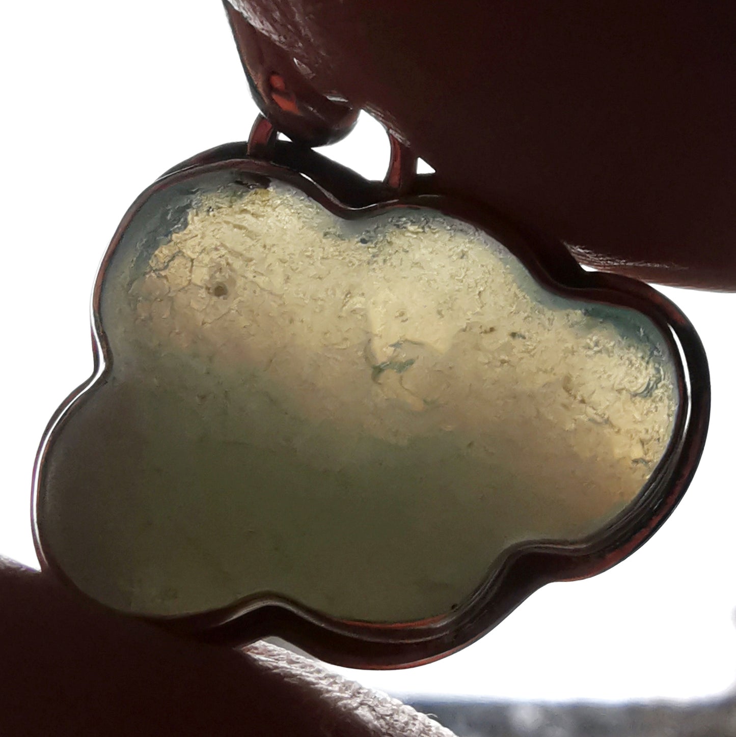 Opalescent sea glass cloud & sterling silver pendant.