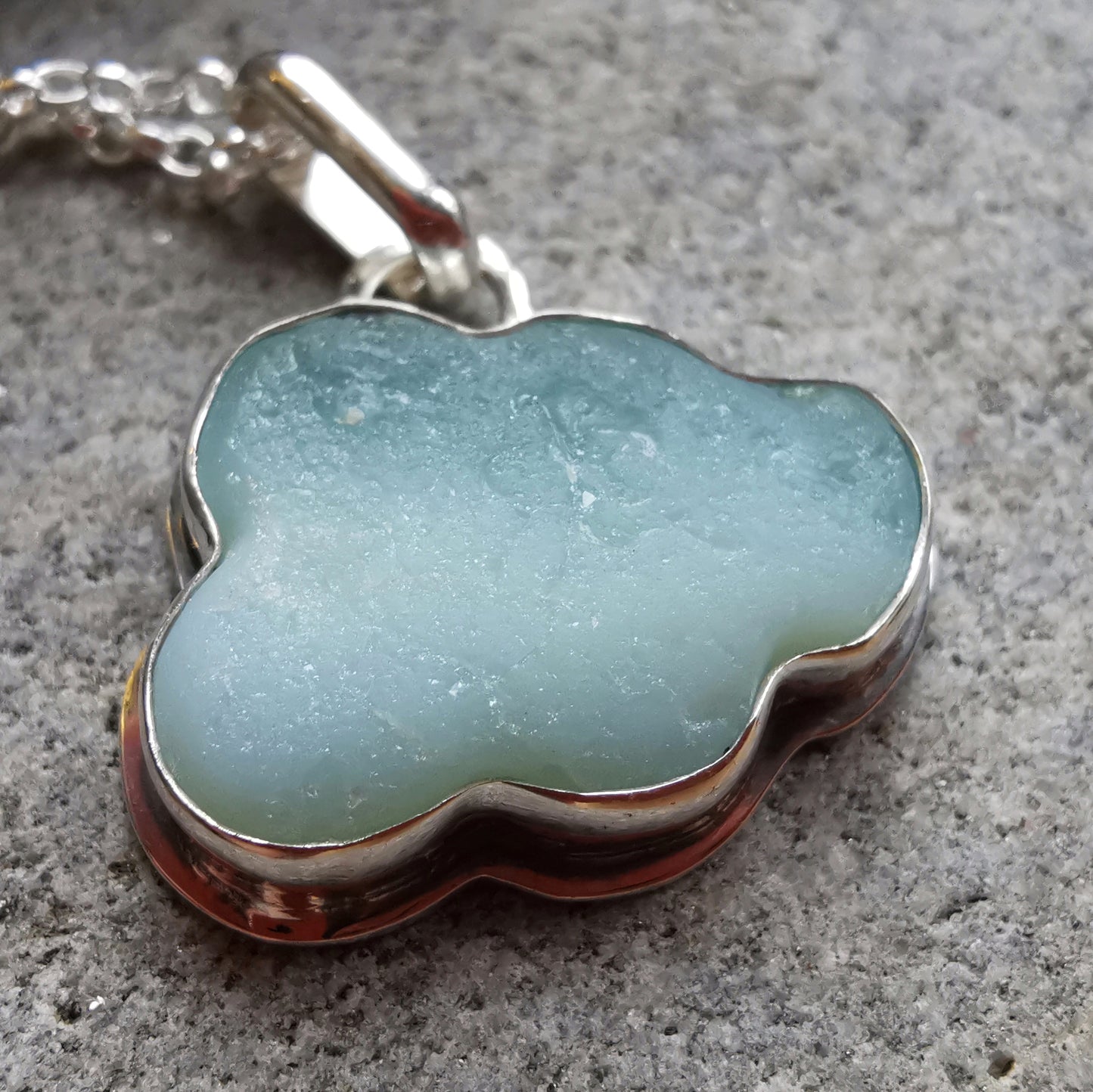 Opalescent sea glass cloud & sterling silver pendant.