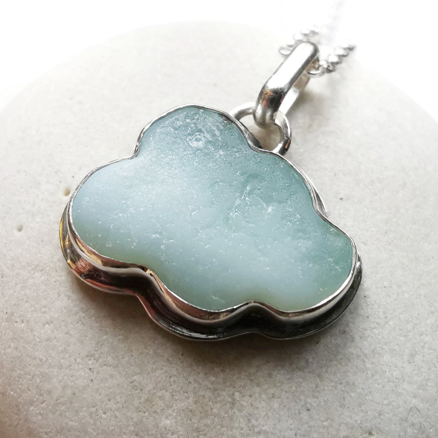 Opalescent sea glass cloud & sterling silver pendant.