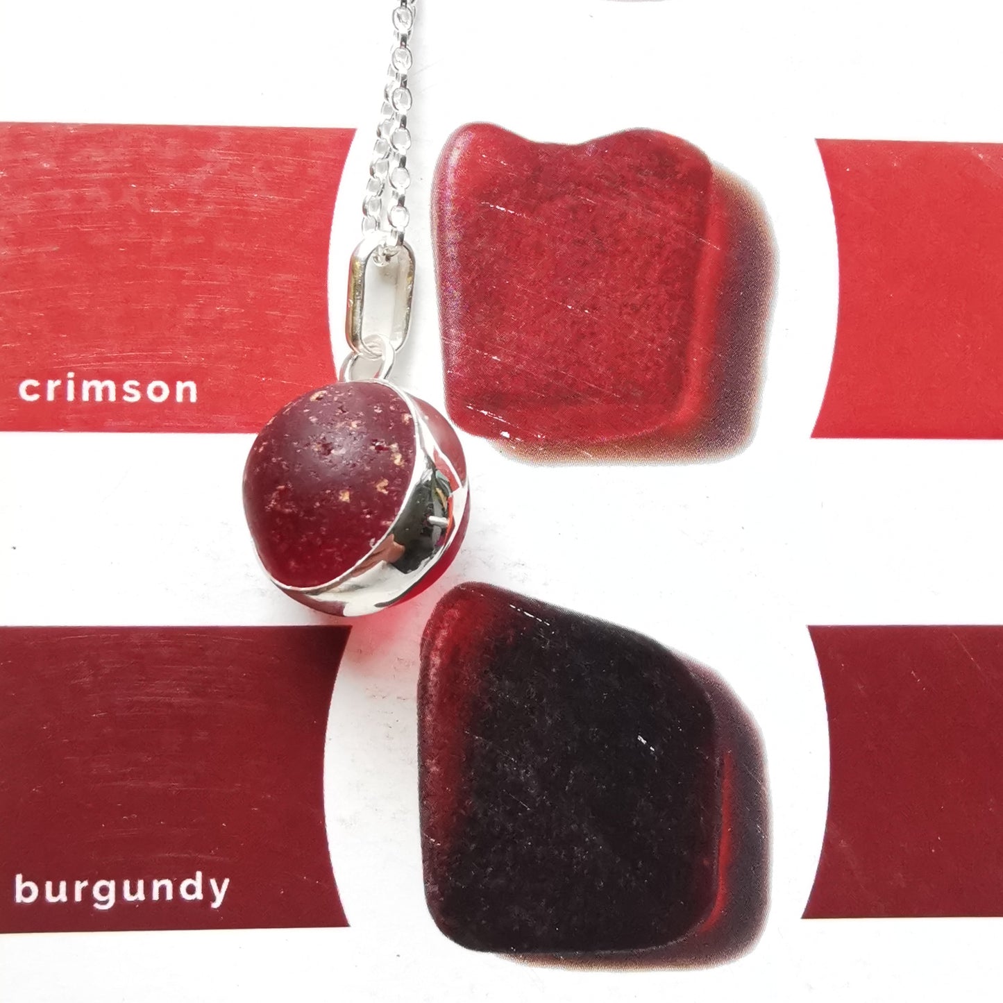 Genuine red sea glass marble & sterling silver pendant.