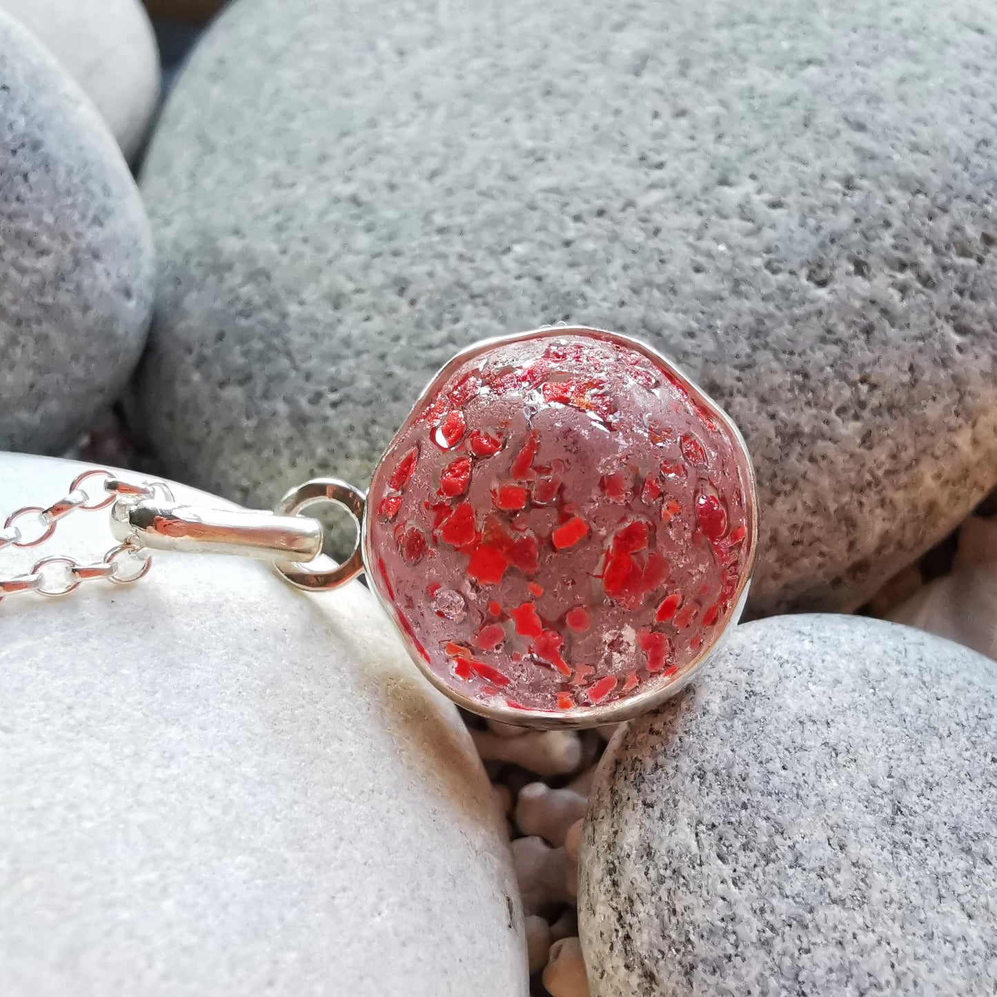 Genuine red speckled confetti sea glass marble & sterling silver pendant.