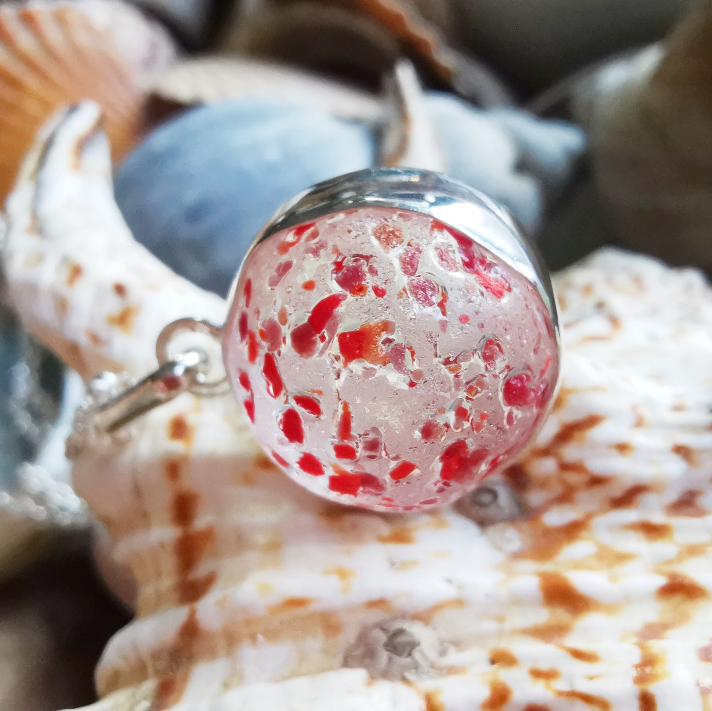 Genuine red speckled confetti sea glass marble & sterling silver pendant.