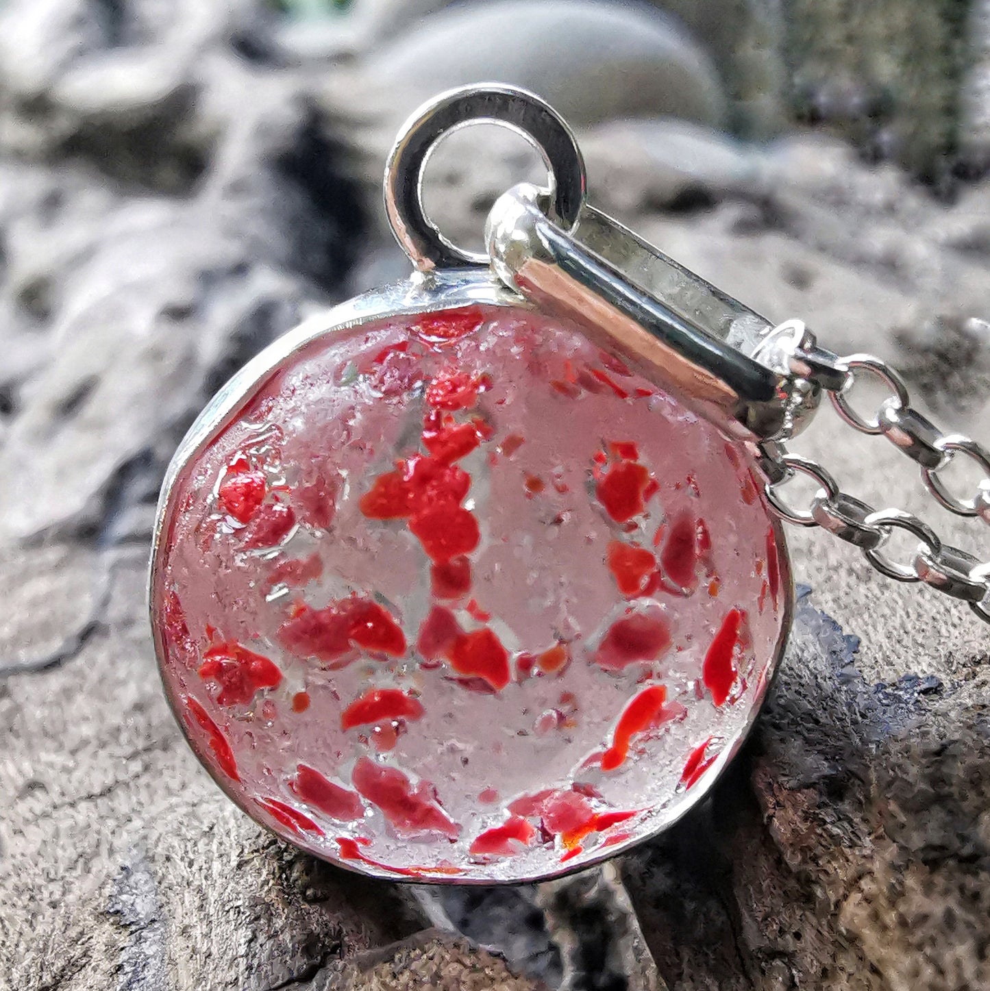 Genuine red speckled confetti sea glass marble & sterling silver pendant.