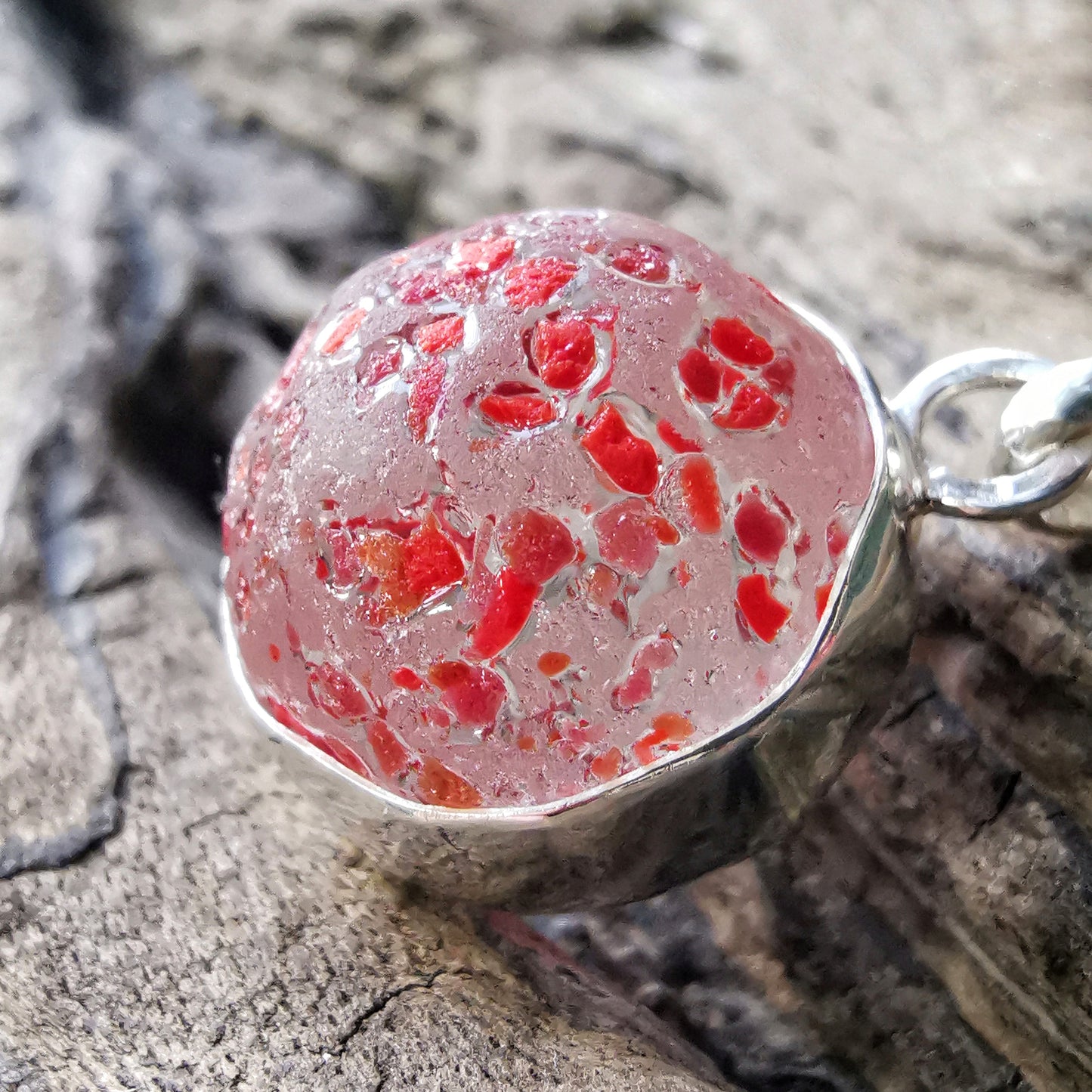 Genuine red speckled confetti sea glass marble & sterling silver pendant.