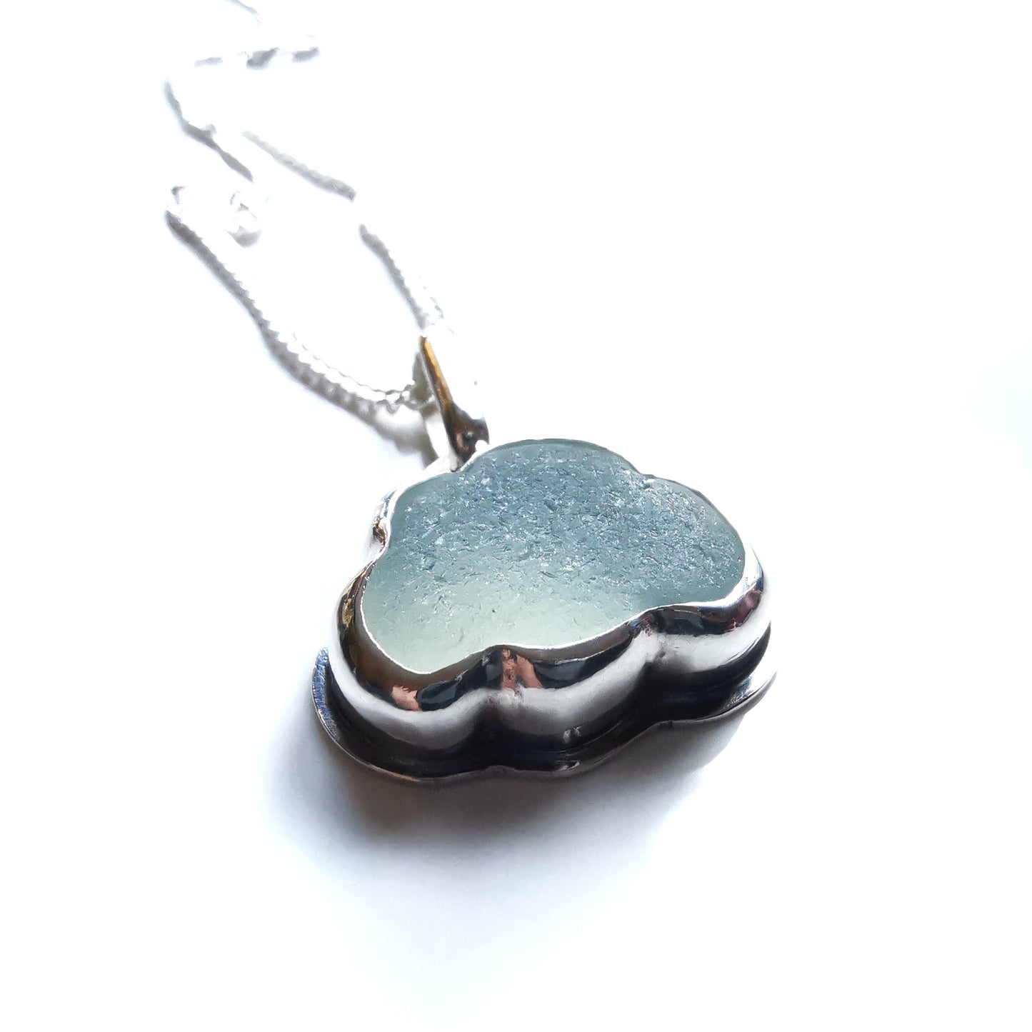 Reserved for Lesley. Genuine opalescent sea glass cloud & sterling silver pendant.