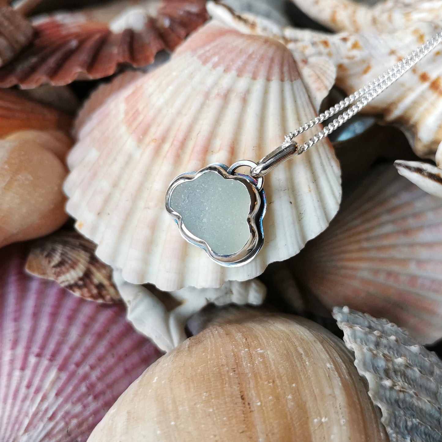 Reserved for Lesley. Genuine opalescent sea glass cloud & sterling silver pendant.