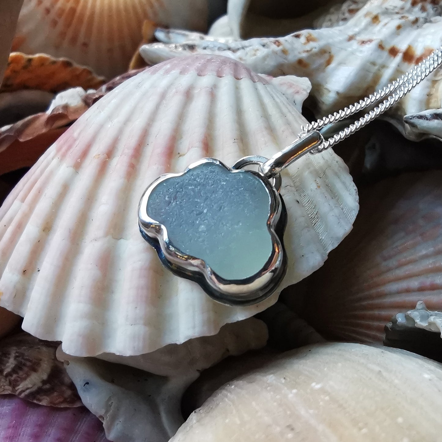 Reserved for Lesley. Genuine opalescent sea glass cloud & sterling silver pendant.
