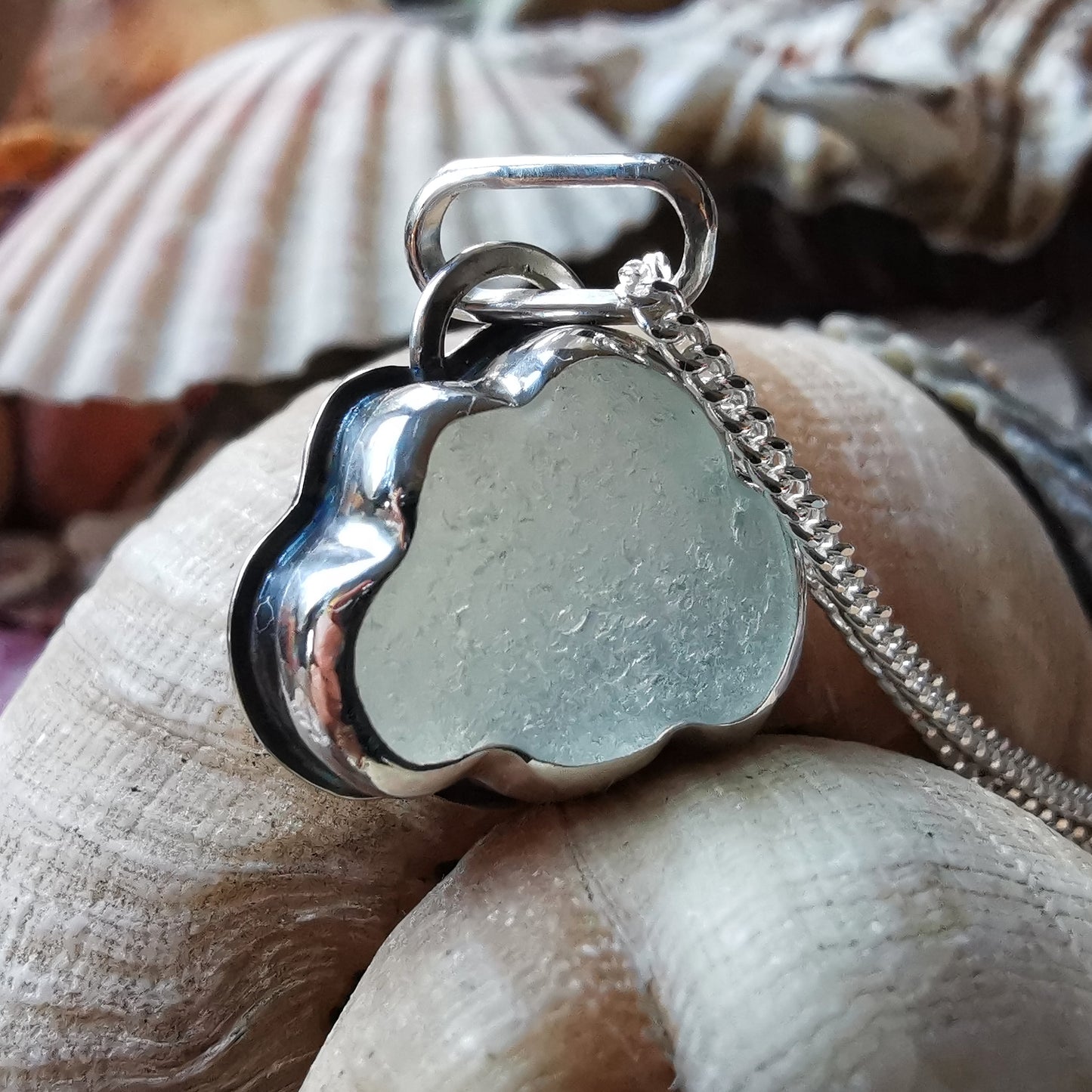 Reserved for Lesley. Genuine opalescent sea glass cloud & sterling silver pendant.