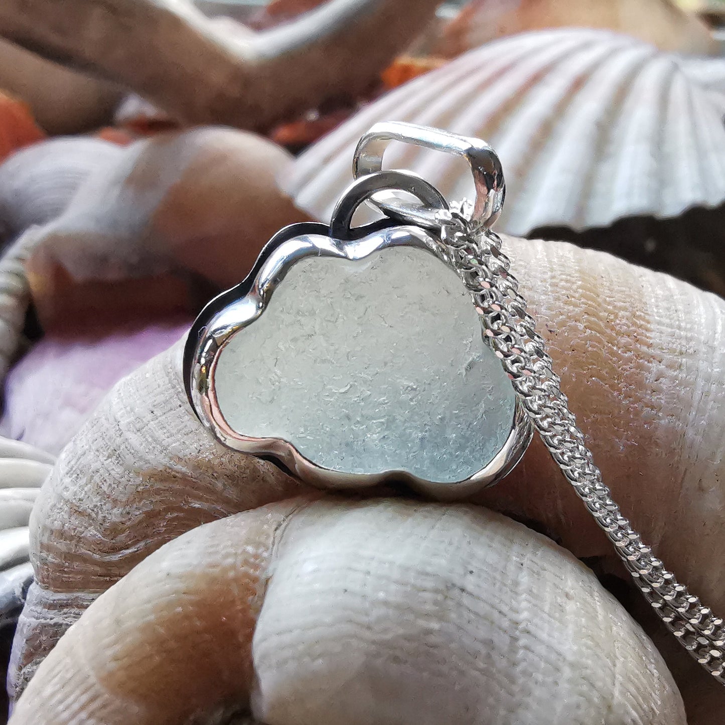 Reserved for Lesley. Genuine opalescent sea glass cloud & sterling silver pendant.