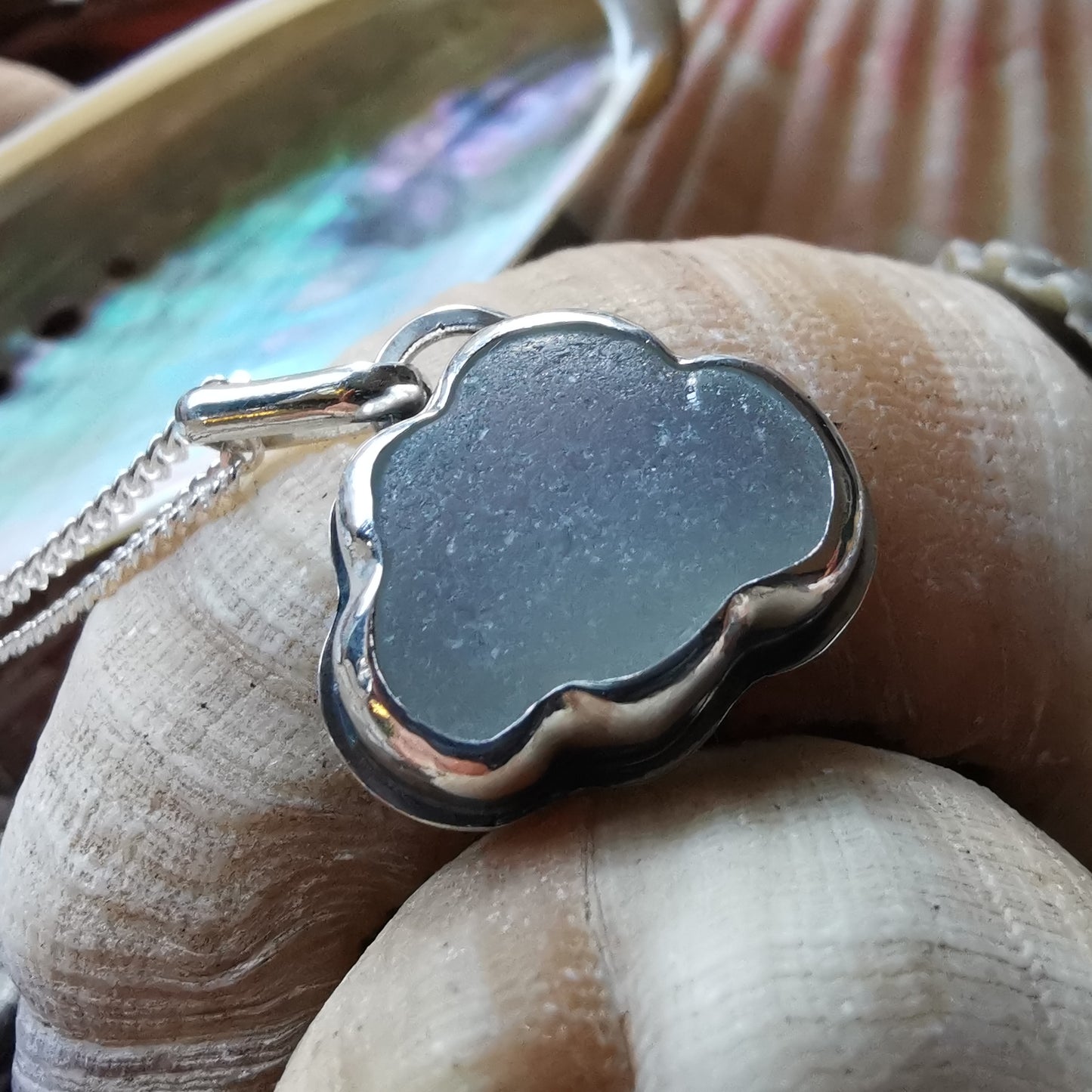 Reserved for Lesley. Genuine opalescent sea glass cloud & sterling silver pendant.