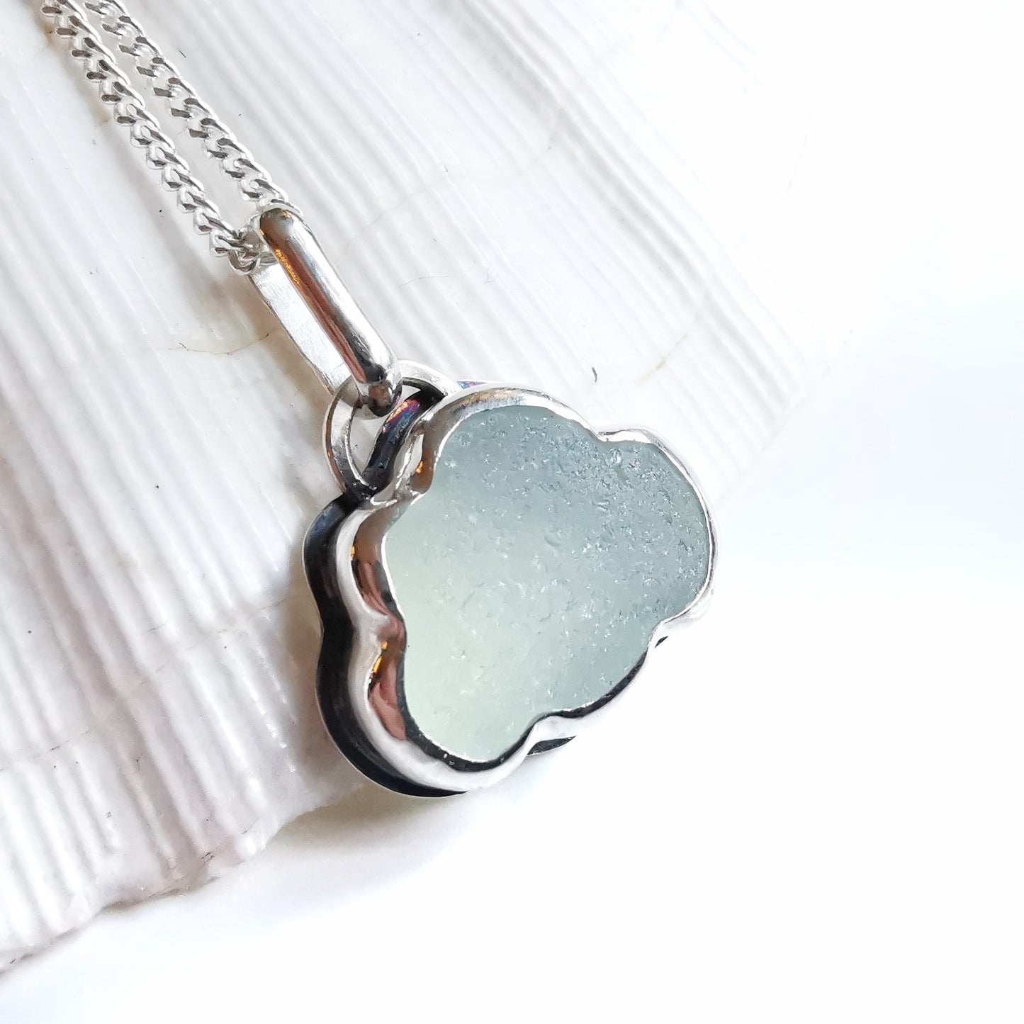 Reserved for Lesley. Genuine opalescent sea glass cloud & sterling silver pendant.