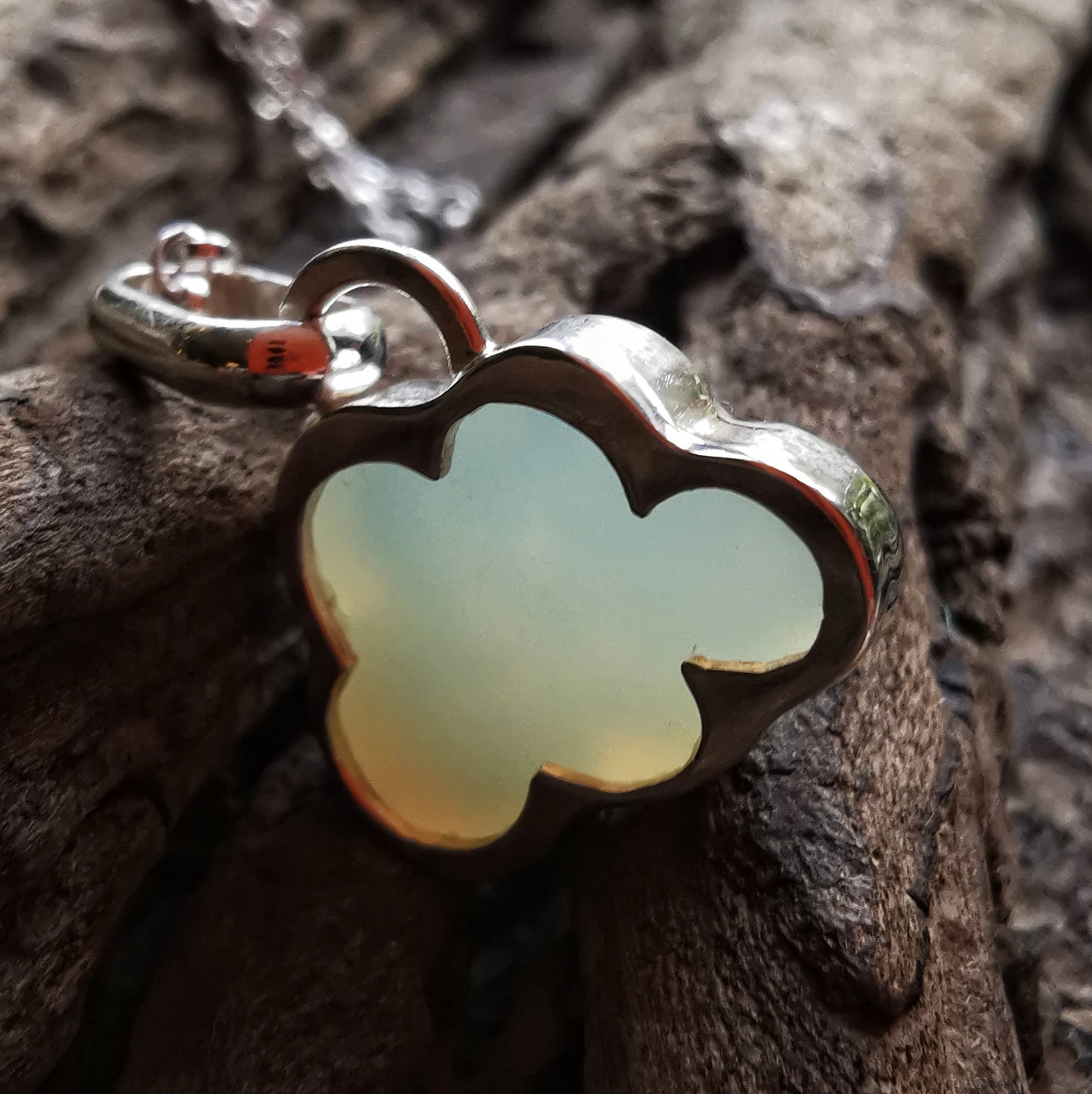 Reserved for Gatia.  Genuine opalescent sea glass cloud & sterling silver pendant.