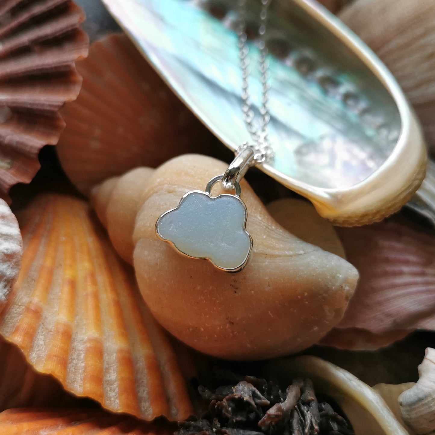 Reserved for Gatia.  Genuine opalescent sea glass cloud & sterling silver pendant.