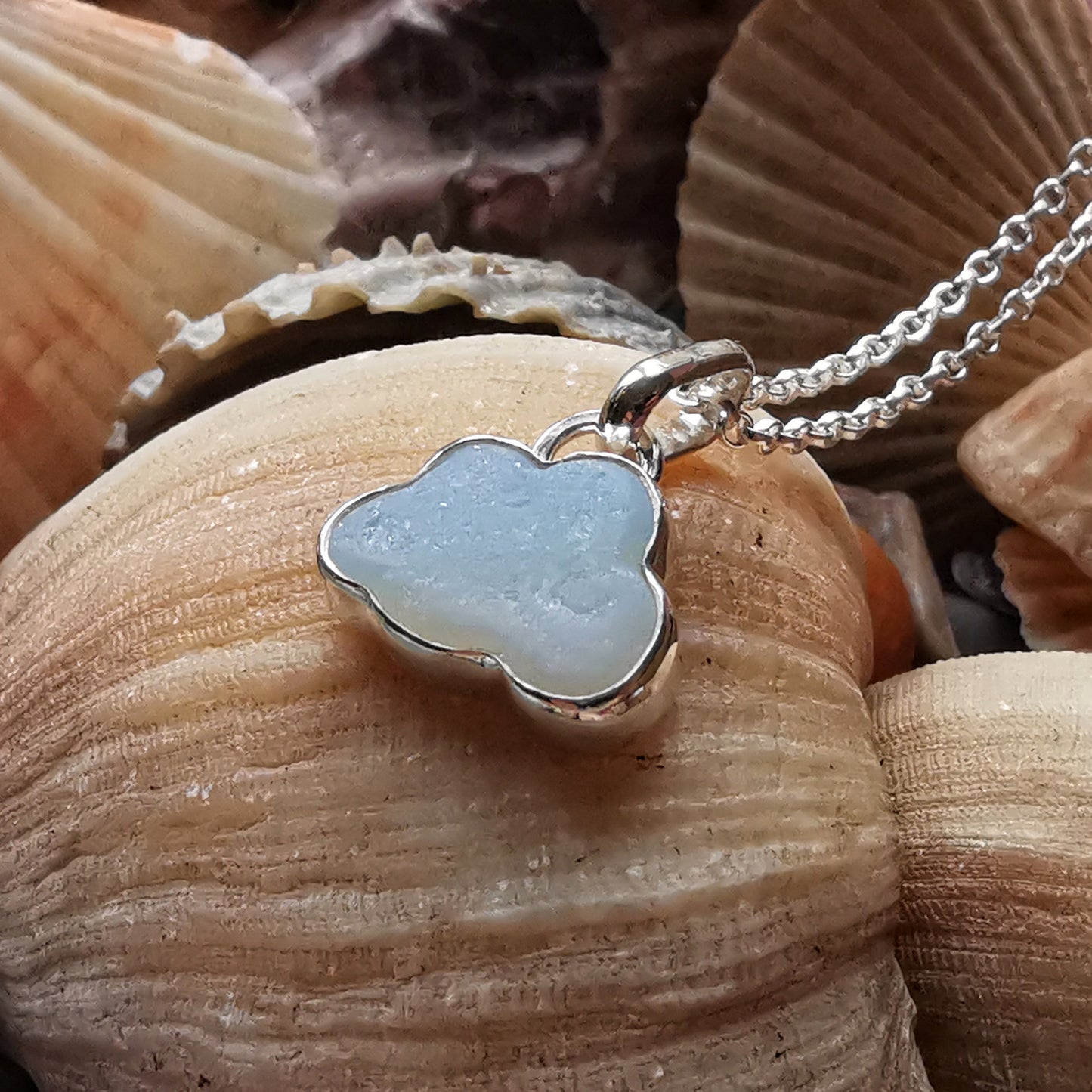 Reserved for Gatia.  Genuine opalescent sea glass cloud & sterling silver pendant.