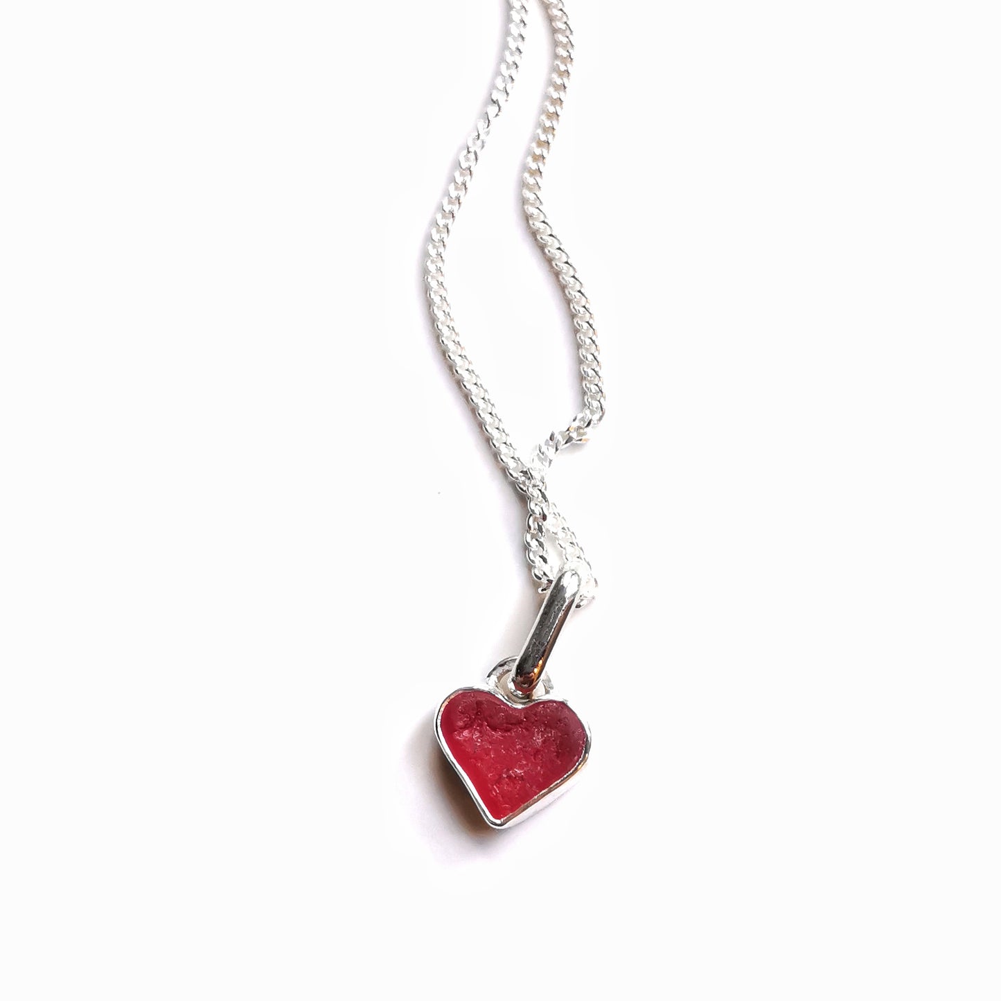 Tiny magenta pink sea glass heart & sterling silver pendant.