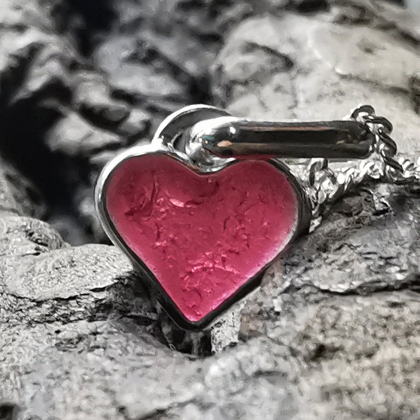 Tiny magenta pink sea glass heart & sterling silver pendant.