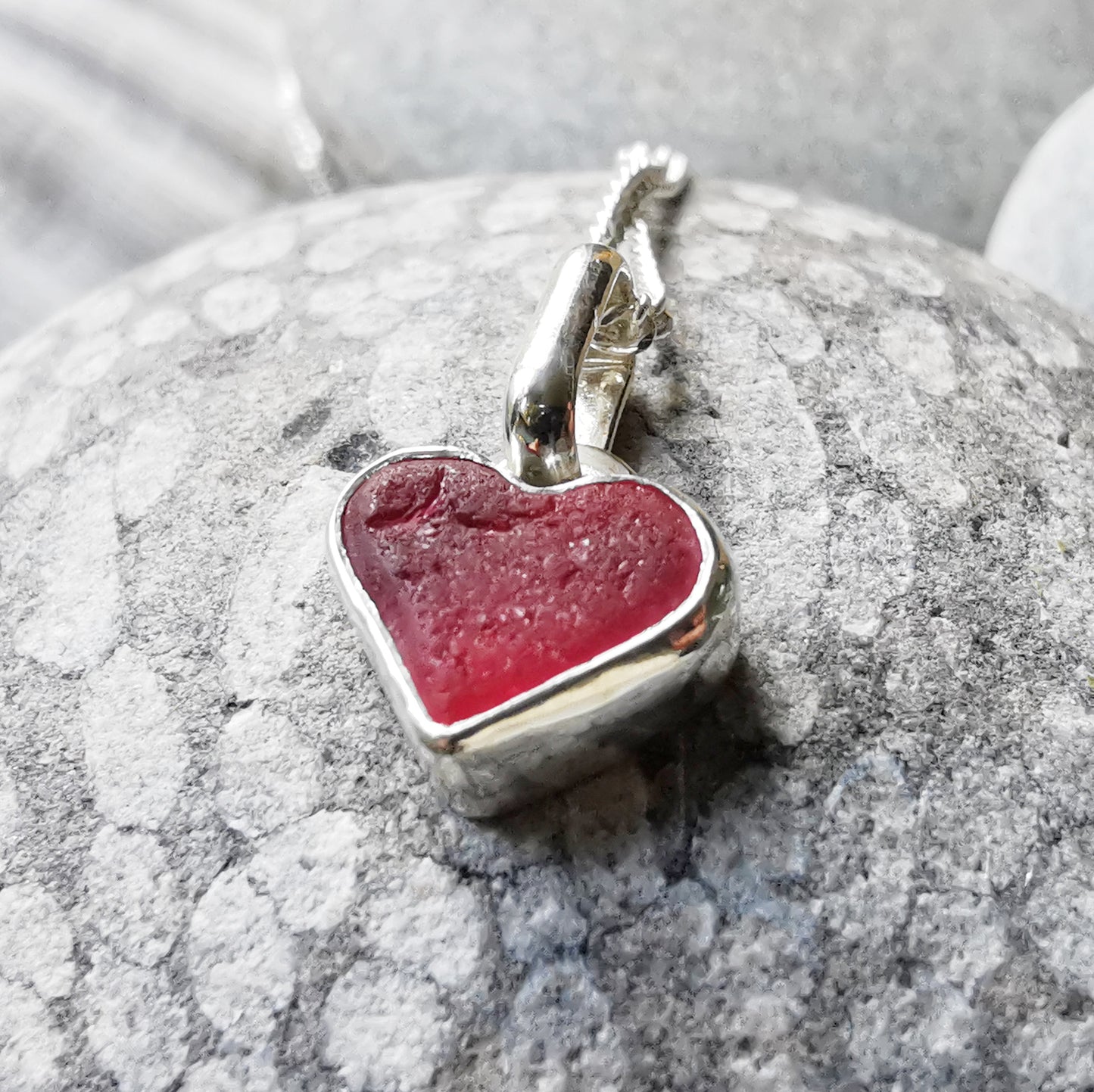 Tiny magenta pink sea glass heart & sterling silver pendant.
