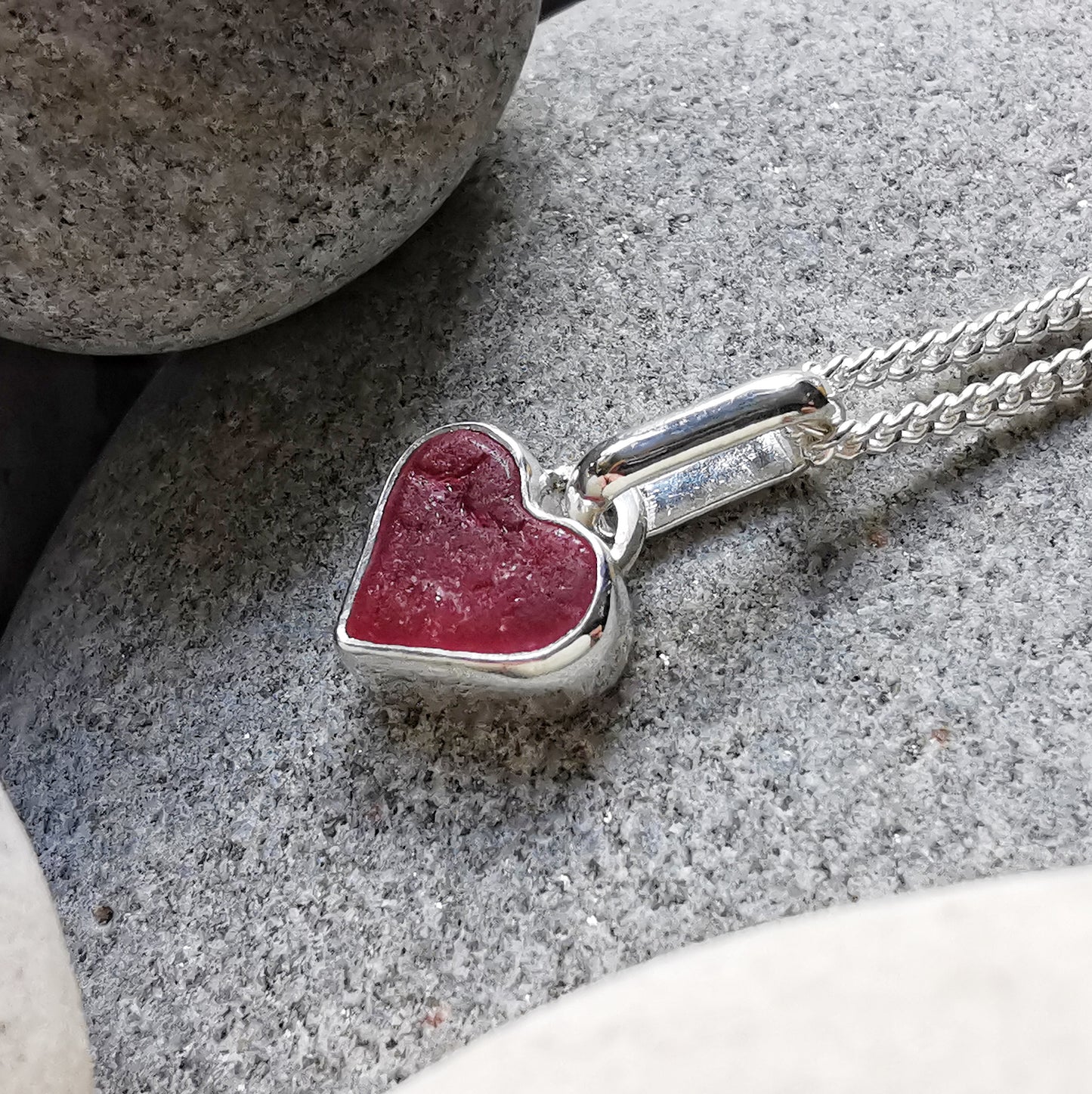 Tiny magenta pink sea glass heart & sterling silver pendant.