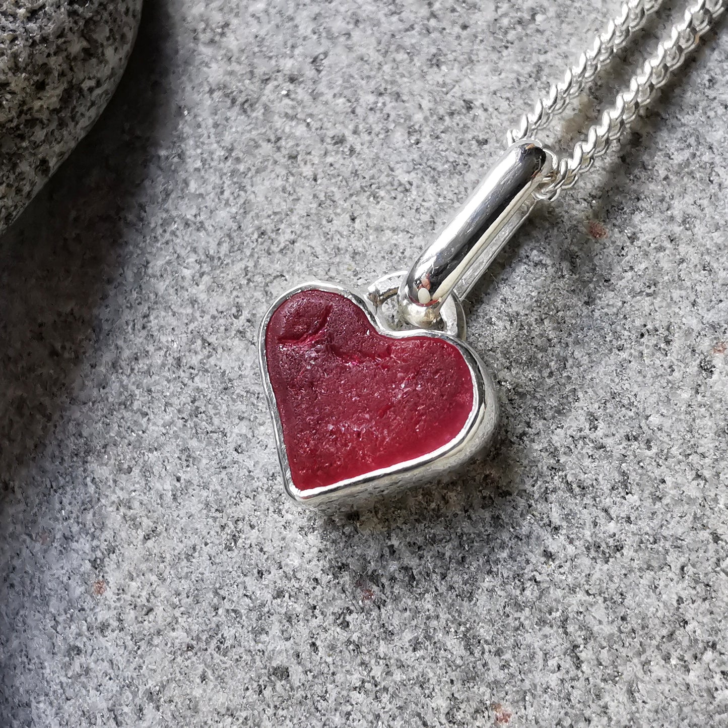 Tiny magenta pink sea glass heart & sterling silver pendant.