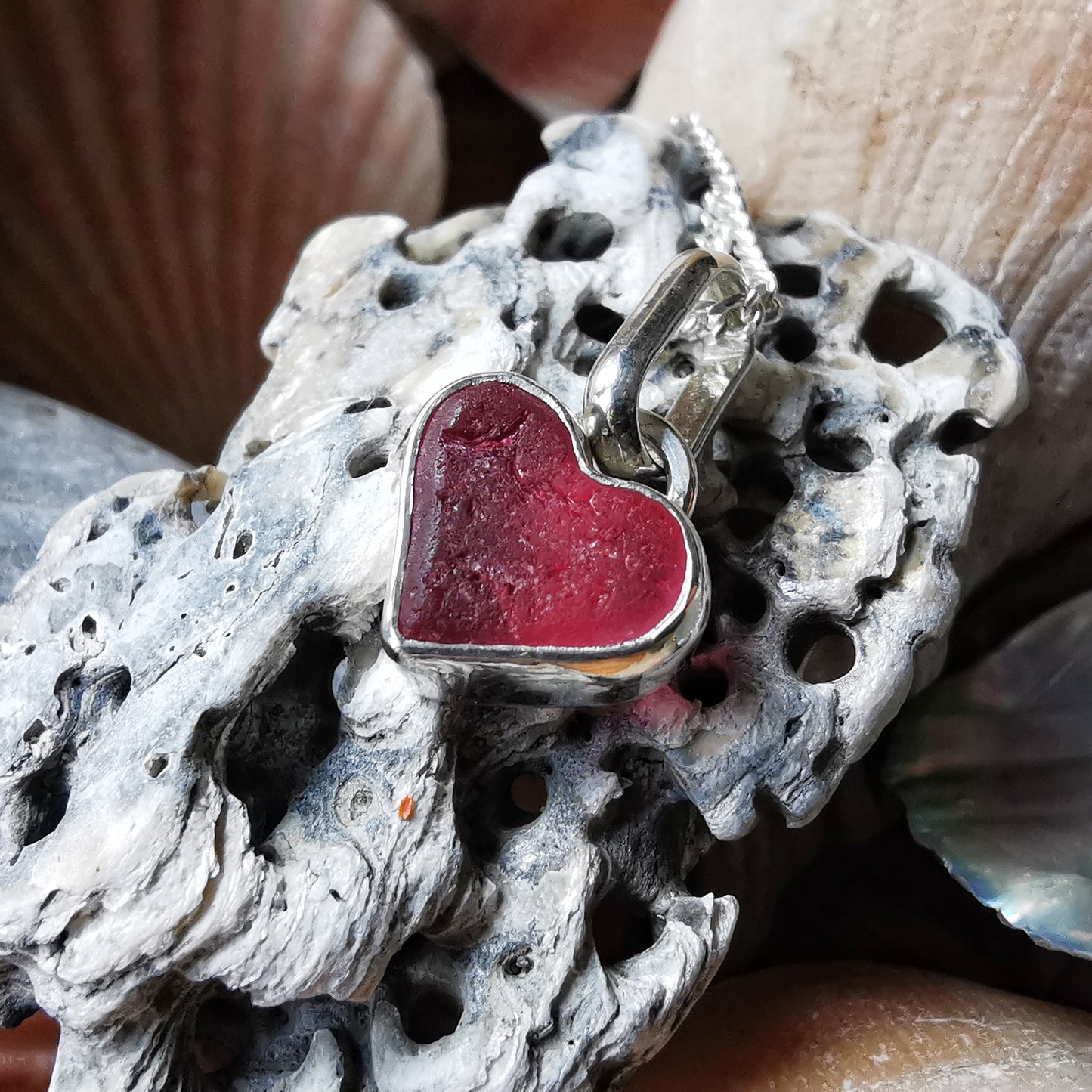 Tiny magenta pink sea glass heart & sterling silver pendant.