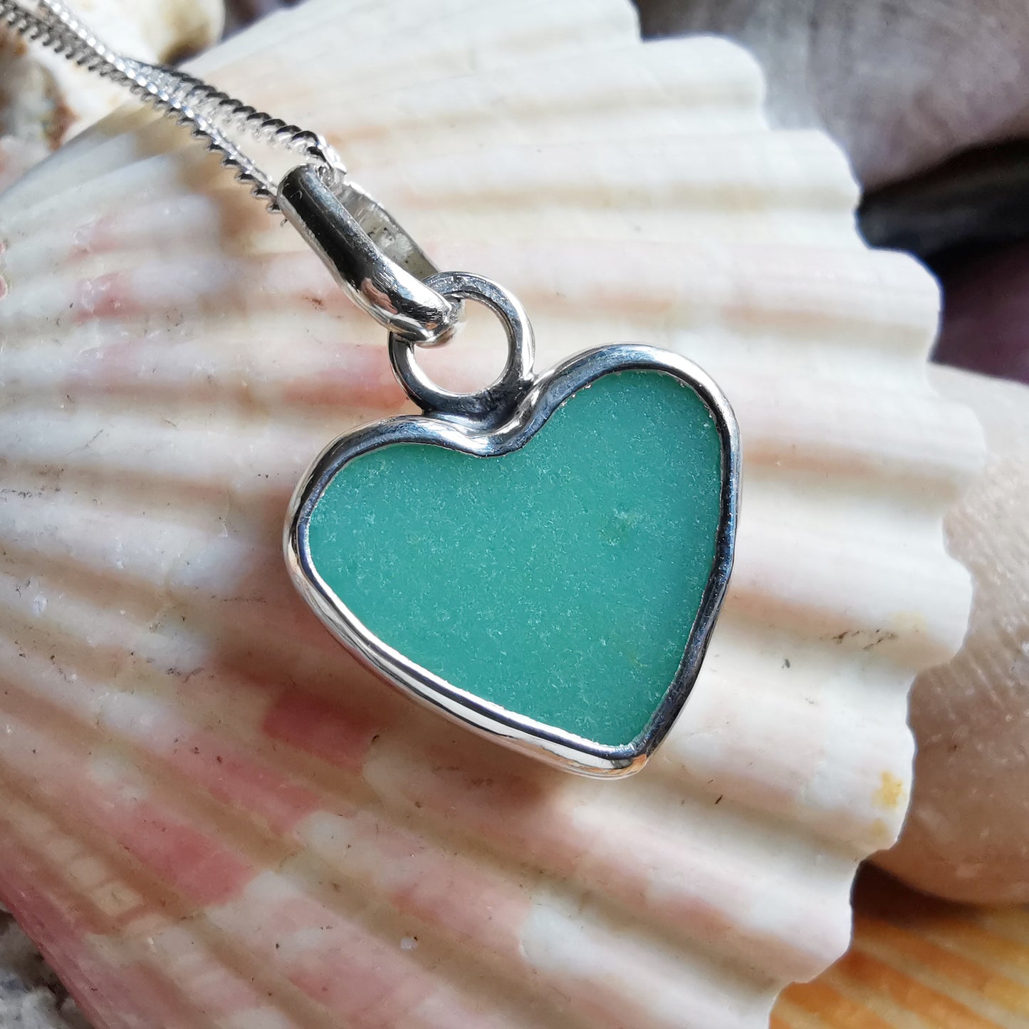 Teal green sea glass heart & sterling silver pendant.