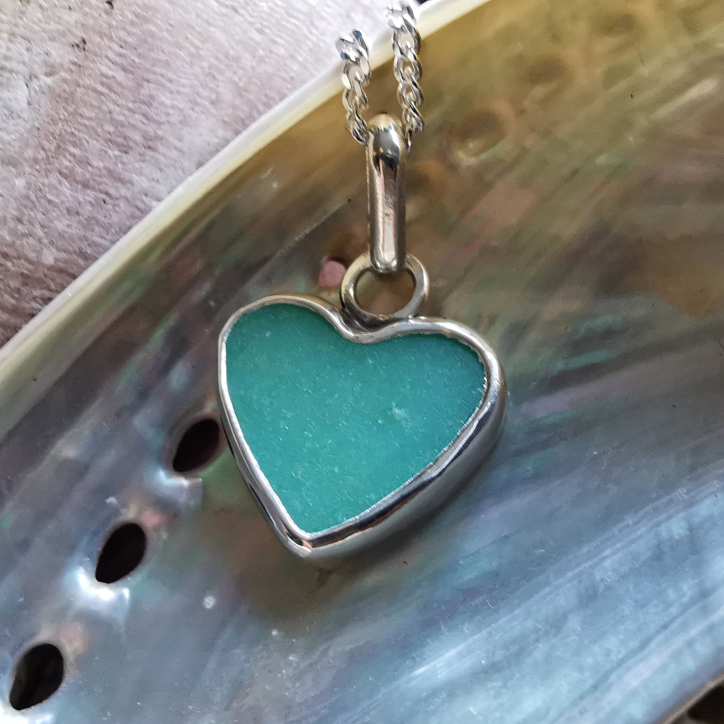 Teal green sea glass heart & sterling silver pendant.