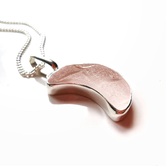Pink crescent moon sea glass & sterling silver pendant.