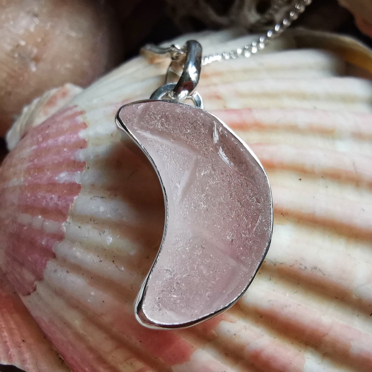Pink crescent moon sea glass & sterling silver pendant.