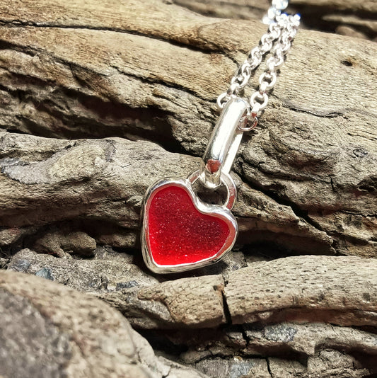 Tiny Scottish UV red sea glass heart & sterling silver pendant.