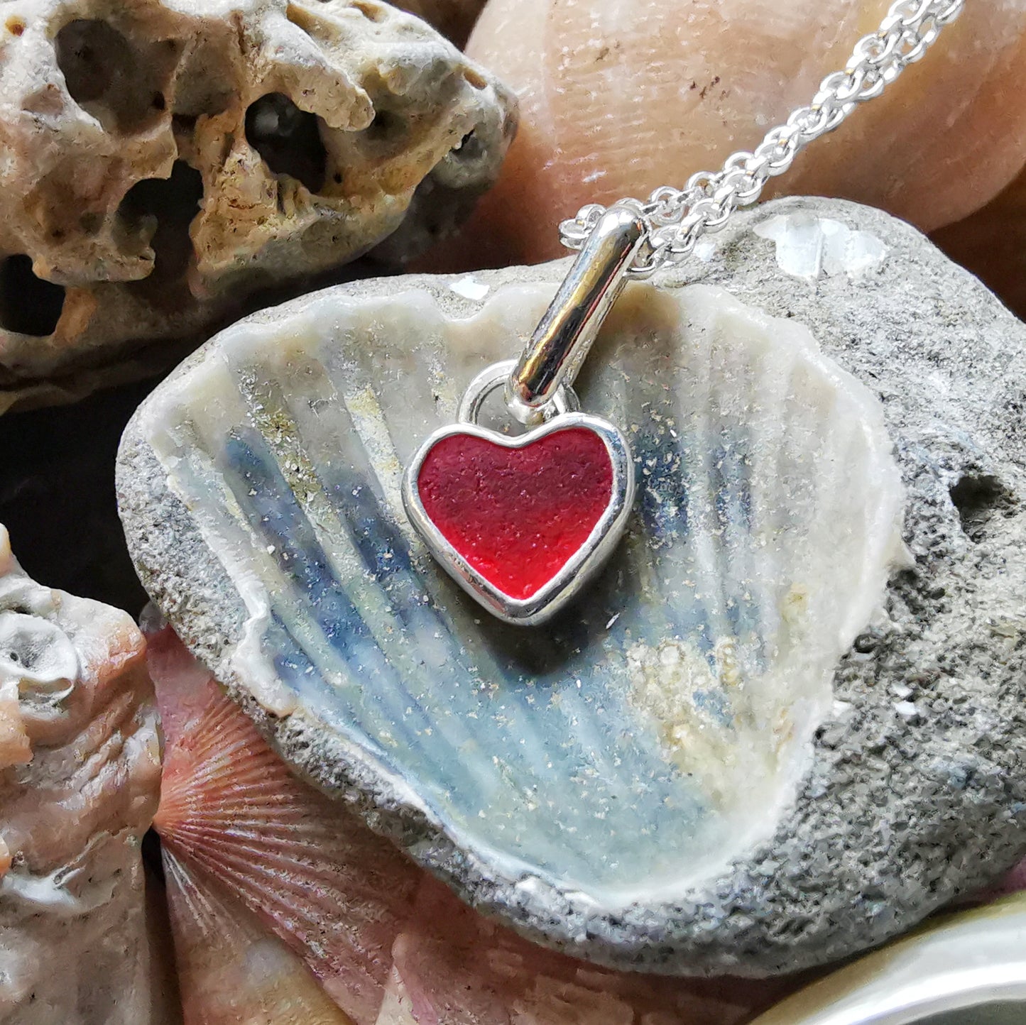 Tiny Scottish UV red sea glass heart & sterling silver pendant.