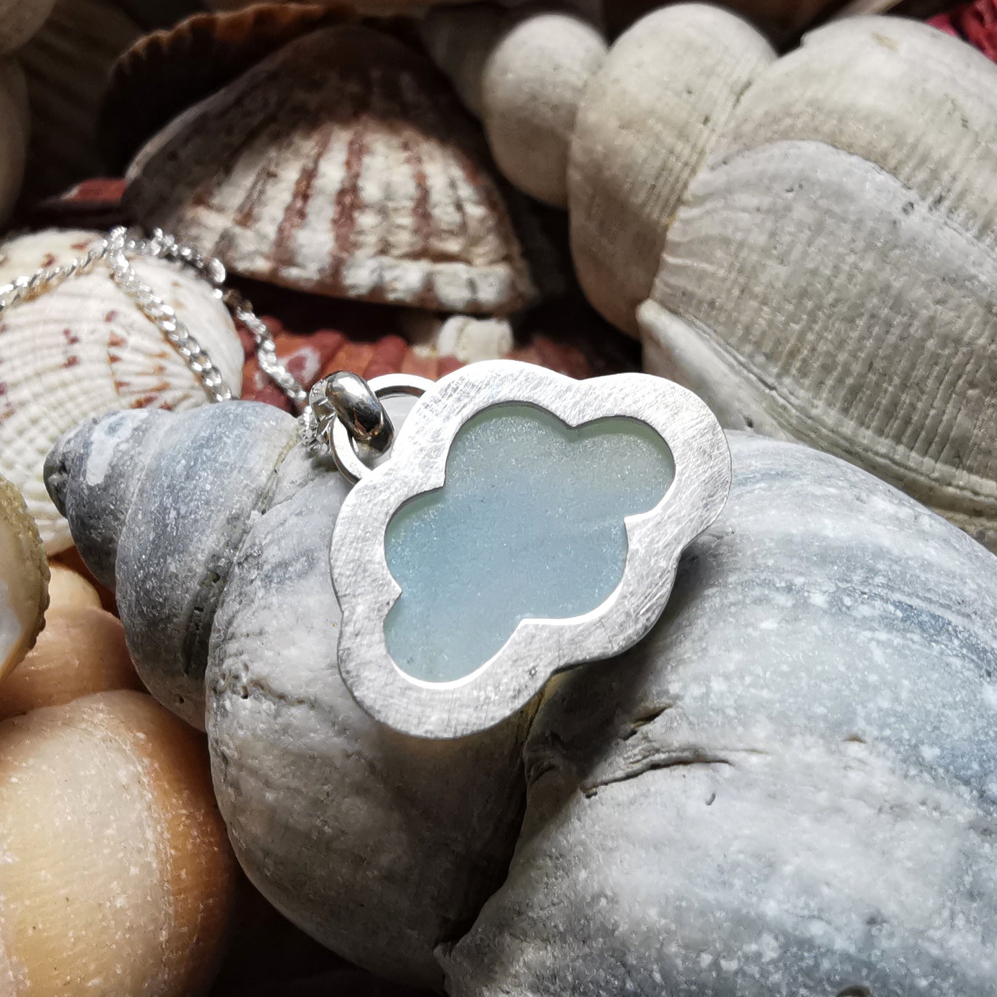 Opalescent sea glass cloud & sterling silver pendant.