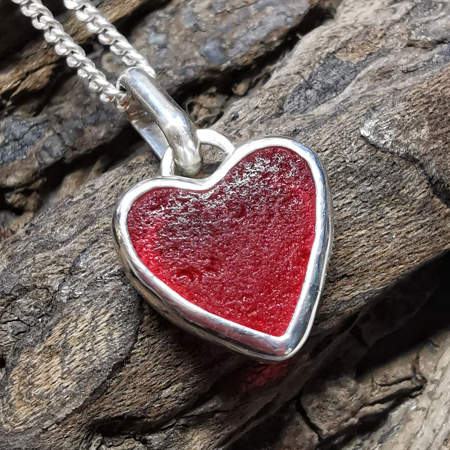 Scottish red UV sea glass heart & sterling silver pendant.