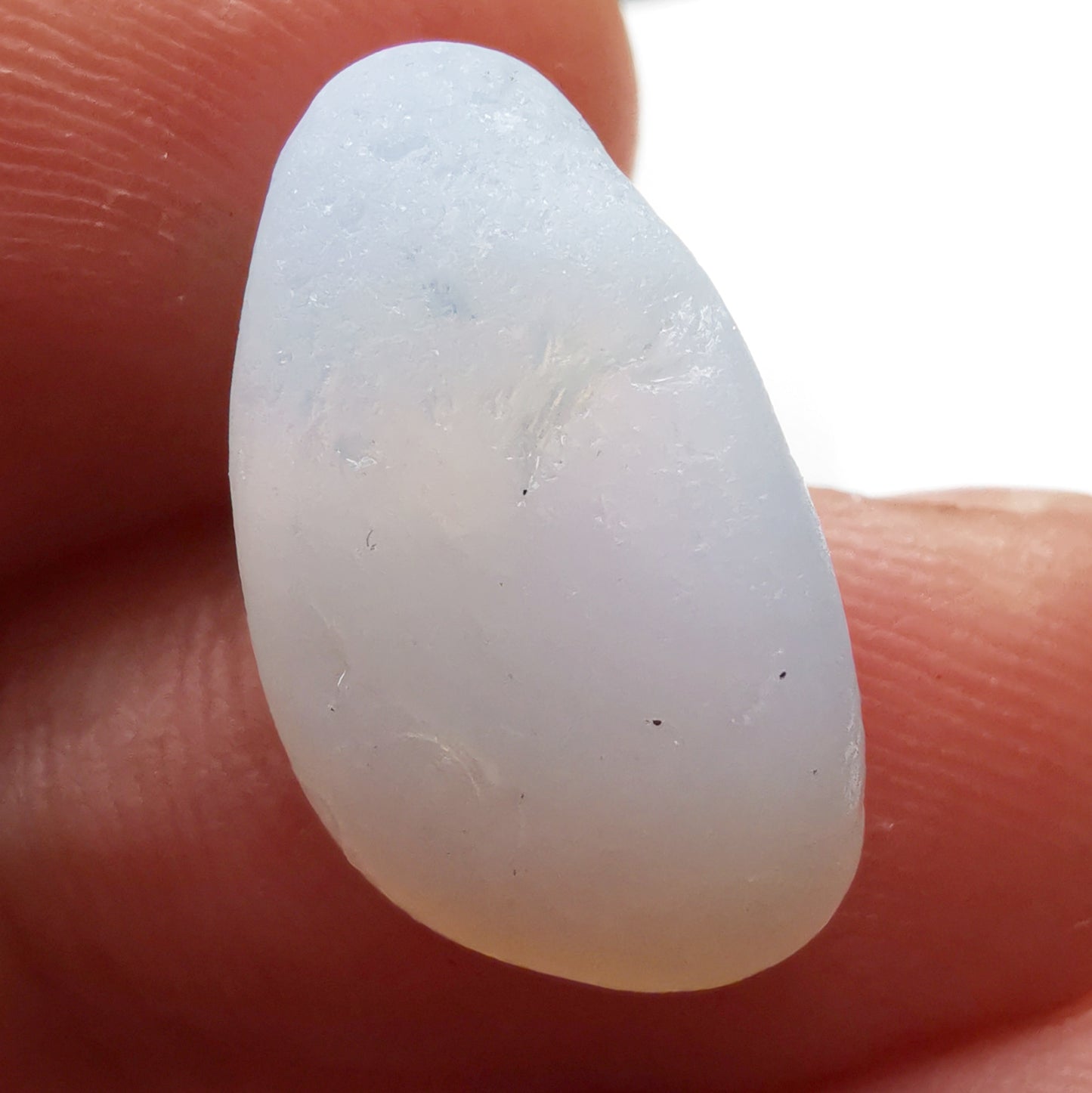 Opalescent crescent moon sea glass & sterling silver pendant.