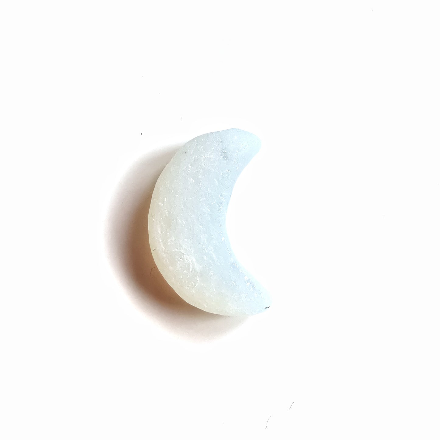 Opalescent crescent moon sea glass & sterling silver pendant.