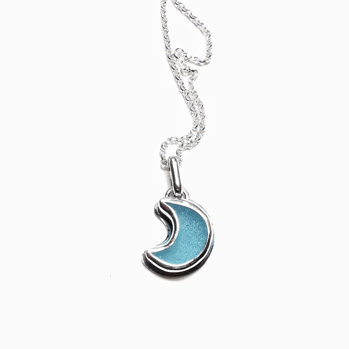 Aqua crescent moon sea glass & sterling silver pendant.
