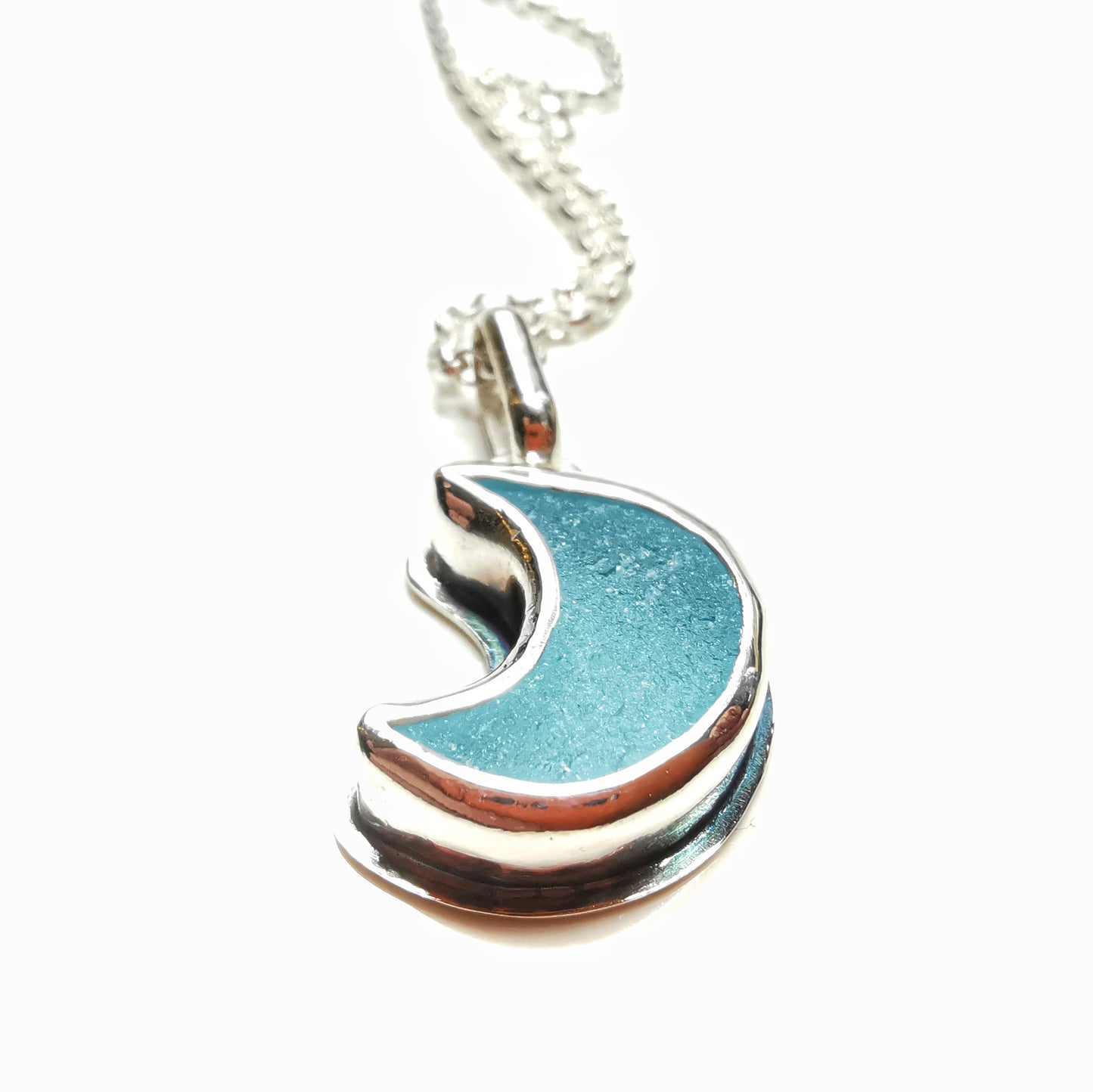 Aqua crescent moon sea glass & sterling silver pendant.