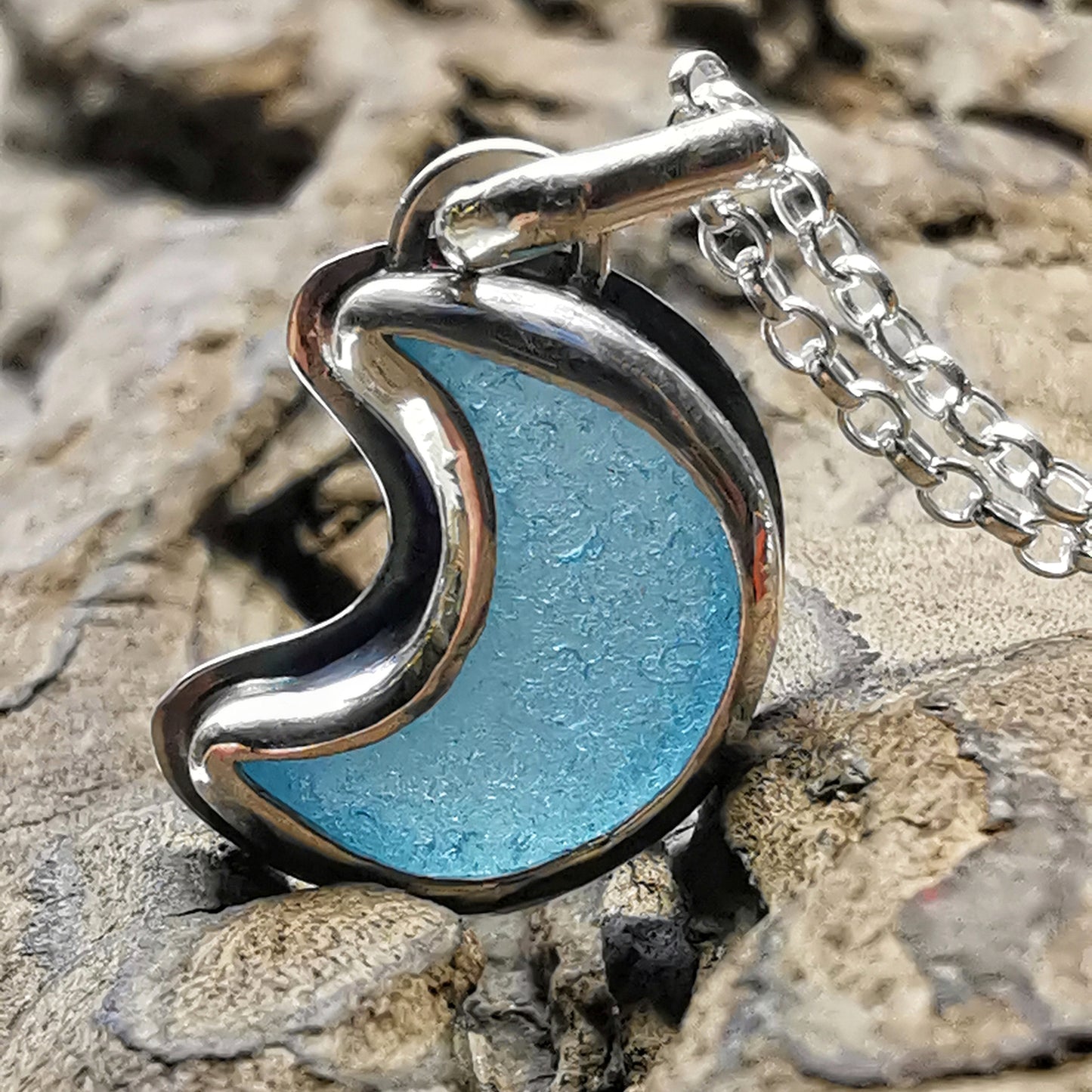 Aqua crescent moon sea glass & sterling silver pendant.