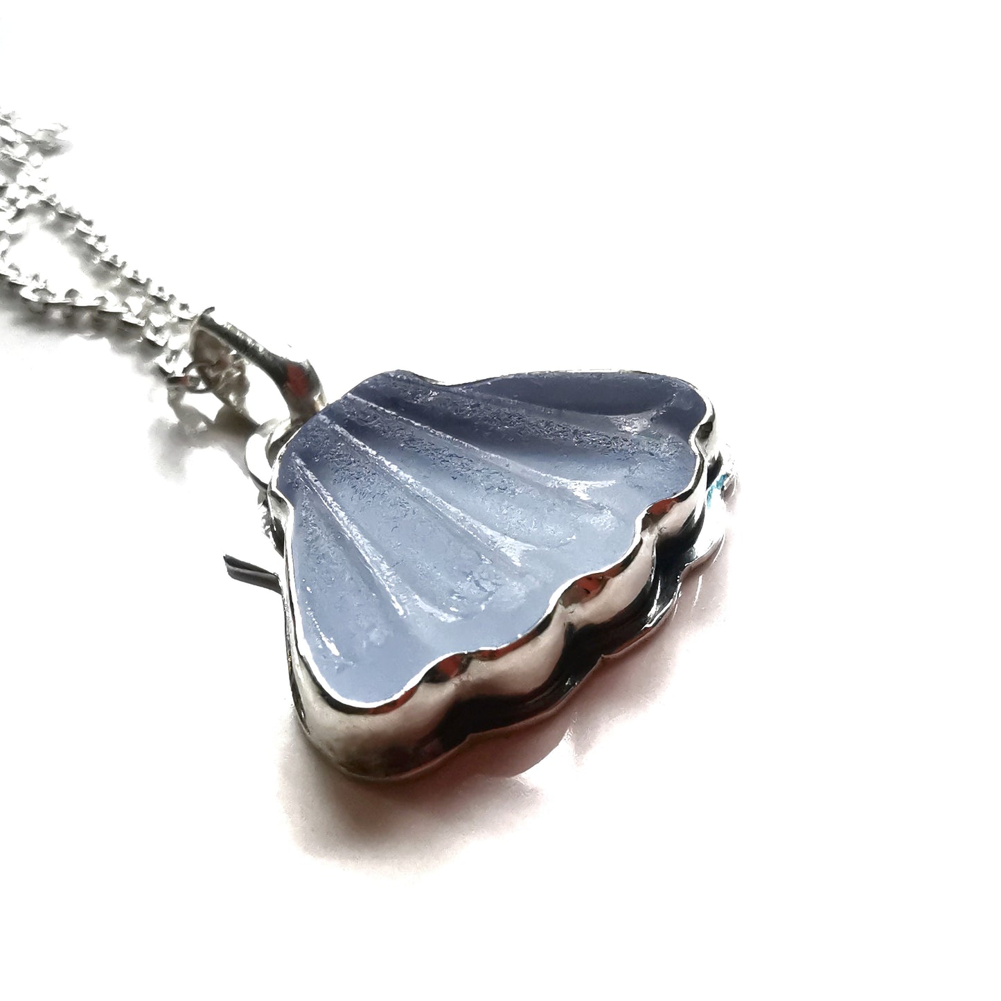 Light blue sea glass shell & sterling silver pendant.