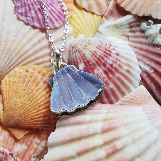 Light blue sea glass shell & sterling silver pendant.